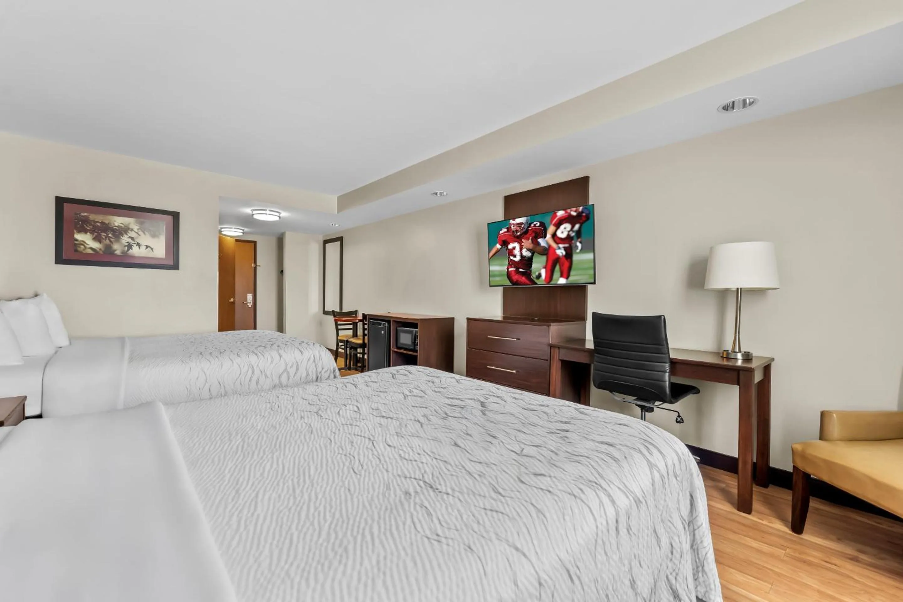 Bed in Red Roof Inn PLUS+ & Suites Malone