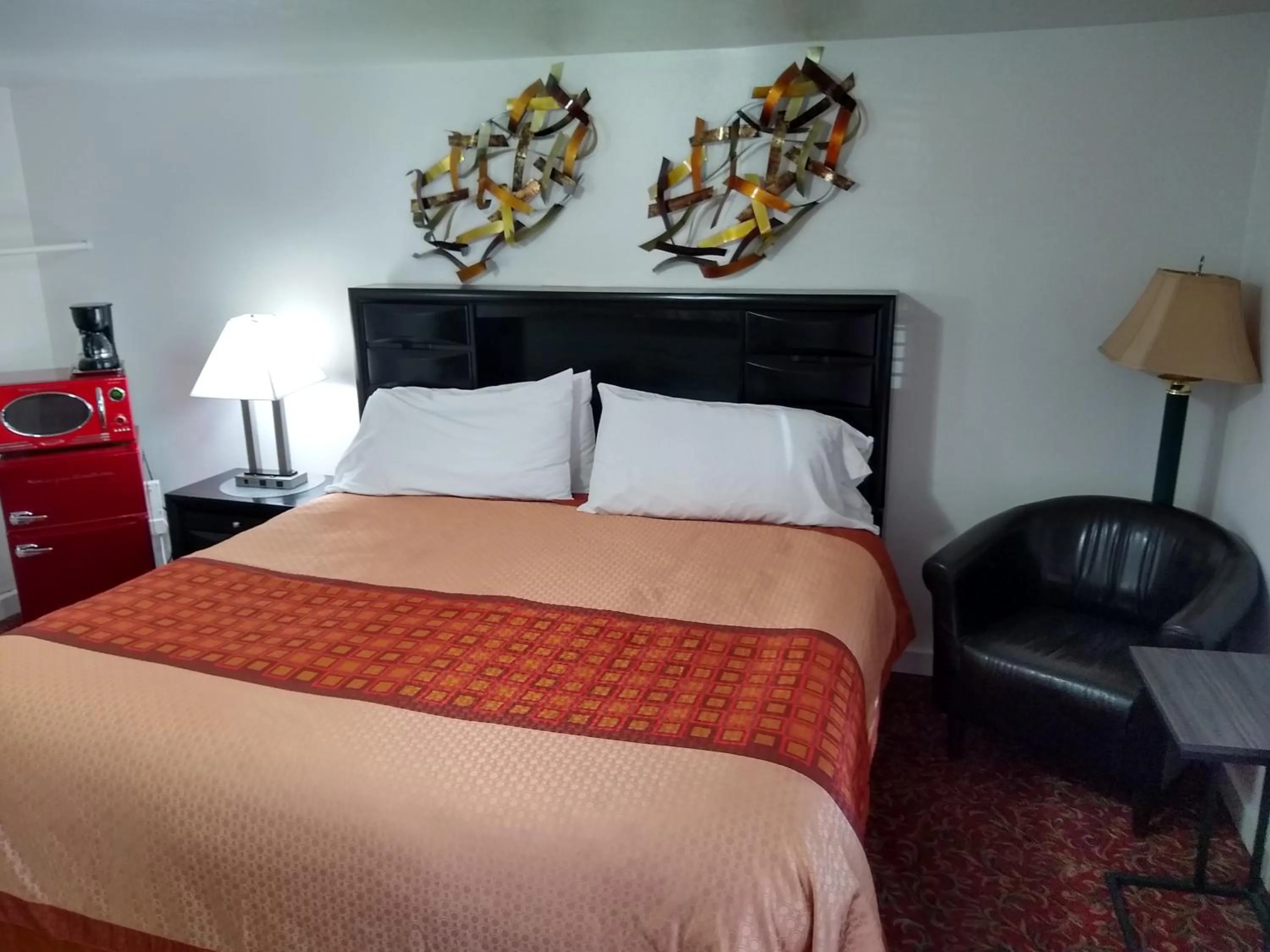 Bed in Holiday Motel Bend