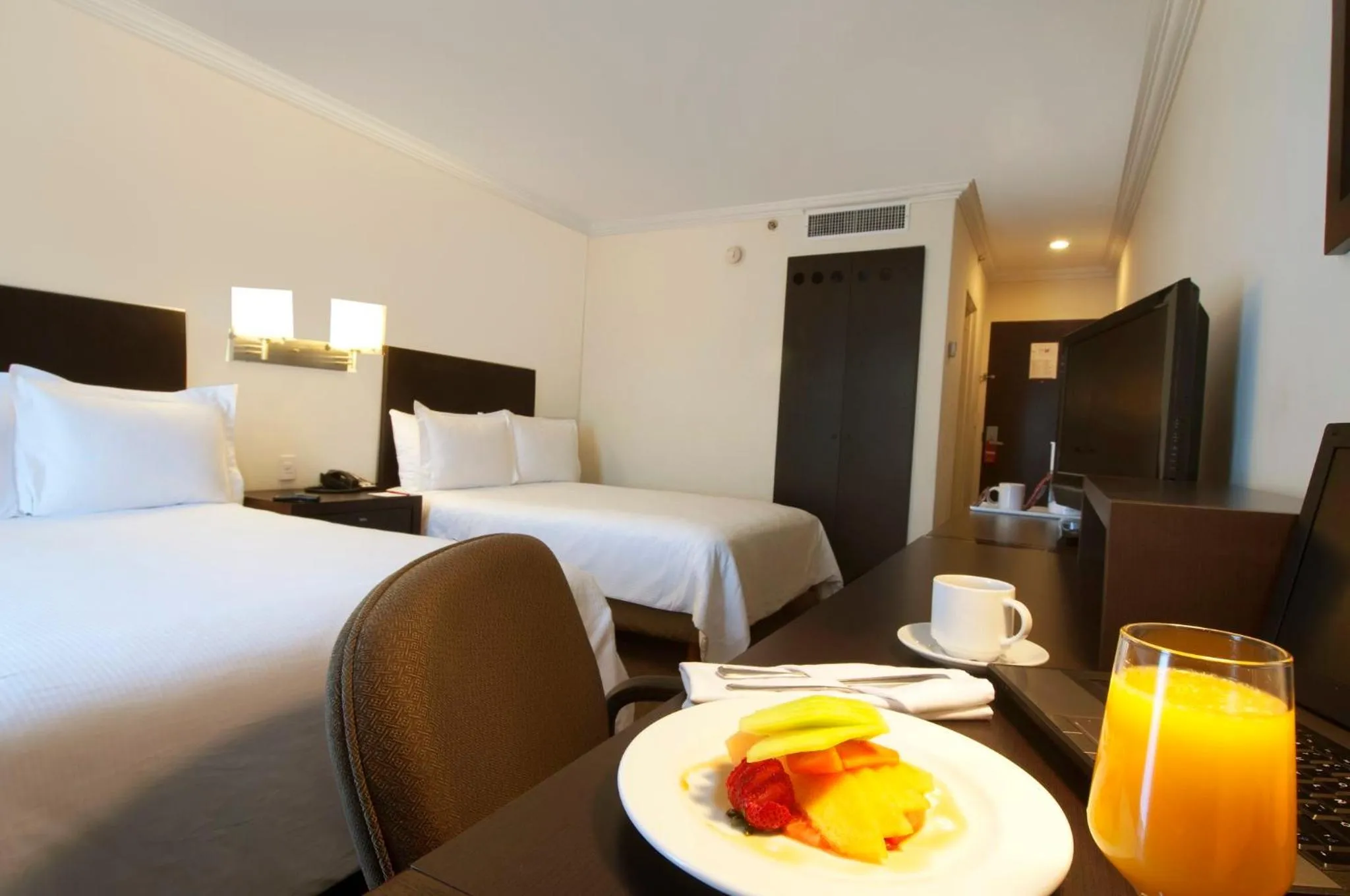 Photo of the whole room, Bed in Fiesta Inn Toluca Centro