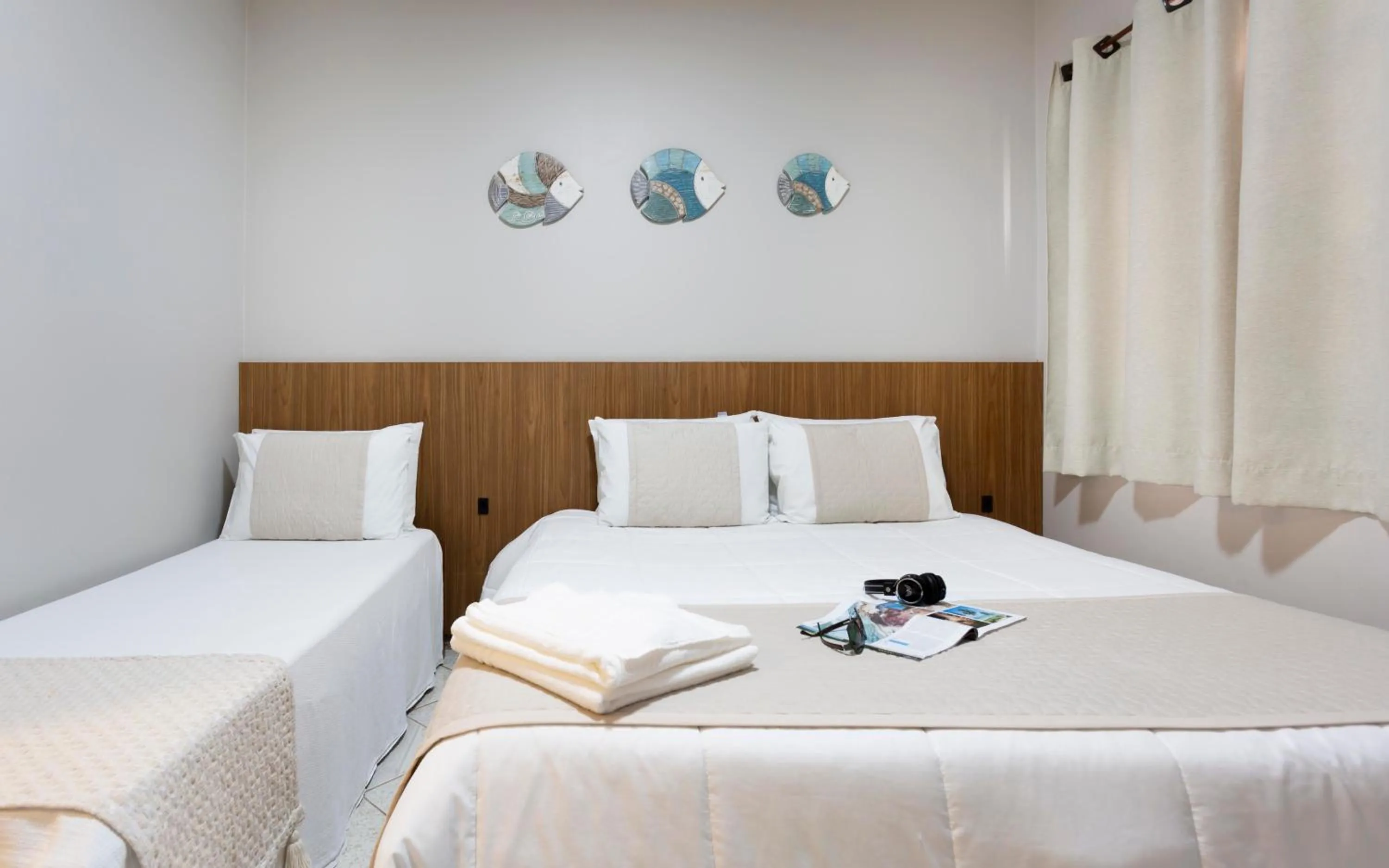 Bed in Pousada Timoneiro