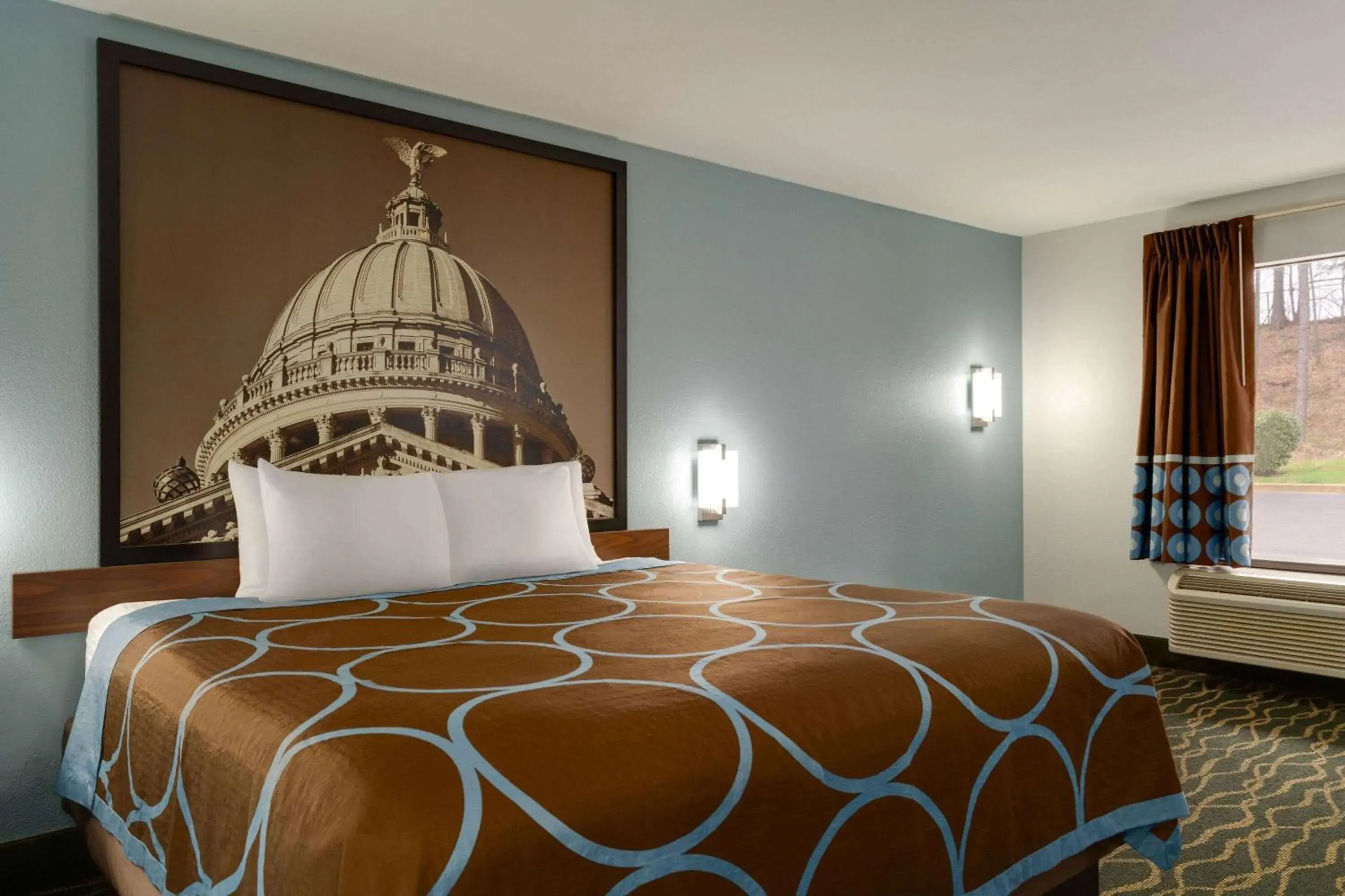 Photo of the whole room, Bed in Super 8 by Wyndham Pearl/Jackson/East Photo of the whole room, Bed in Super 8 by Wyndham Pearl/Jackson/East