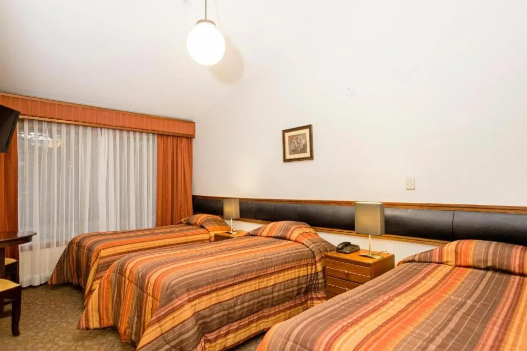 Classic Quadruple Room in Club Hotel Centro de Convenciones Cusco