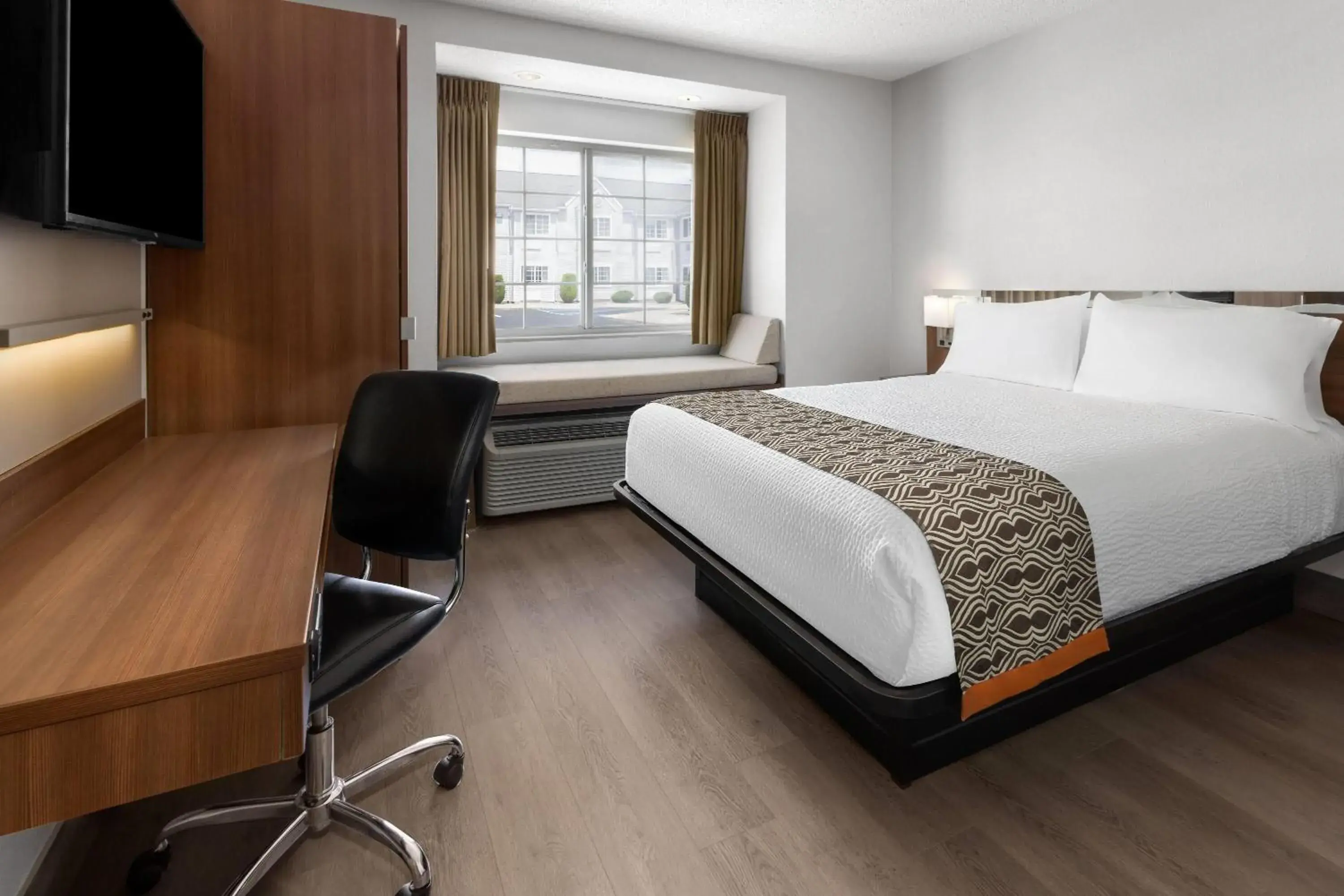 Photo of the whole room, Bed in Microtel Inn by Wyndham - Albany Airport Photo of the whole room, Bed in Microtel Inn by Wyndham - Albany Airport