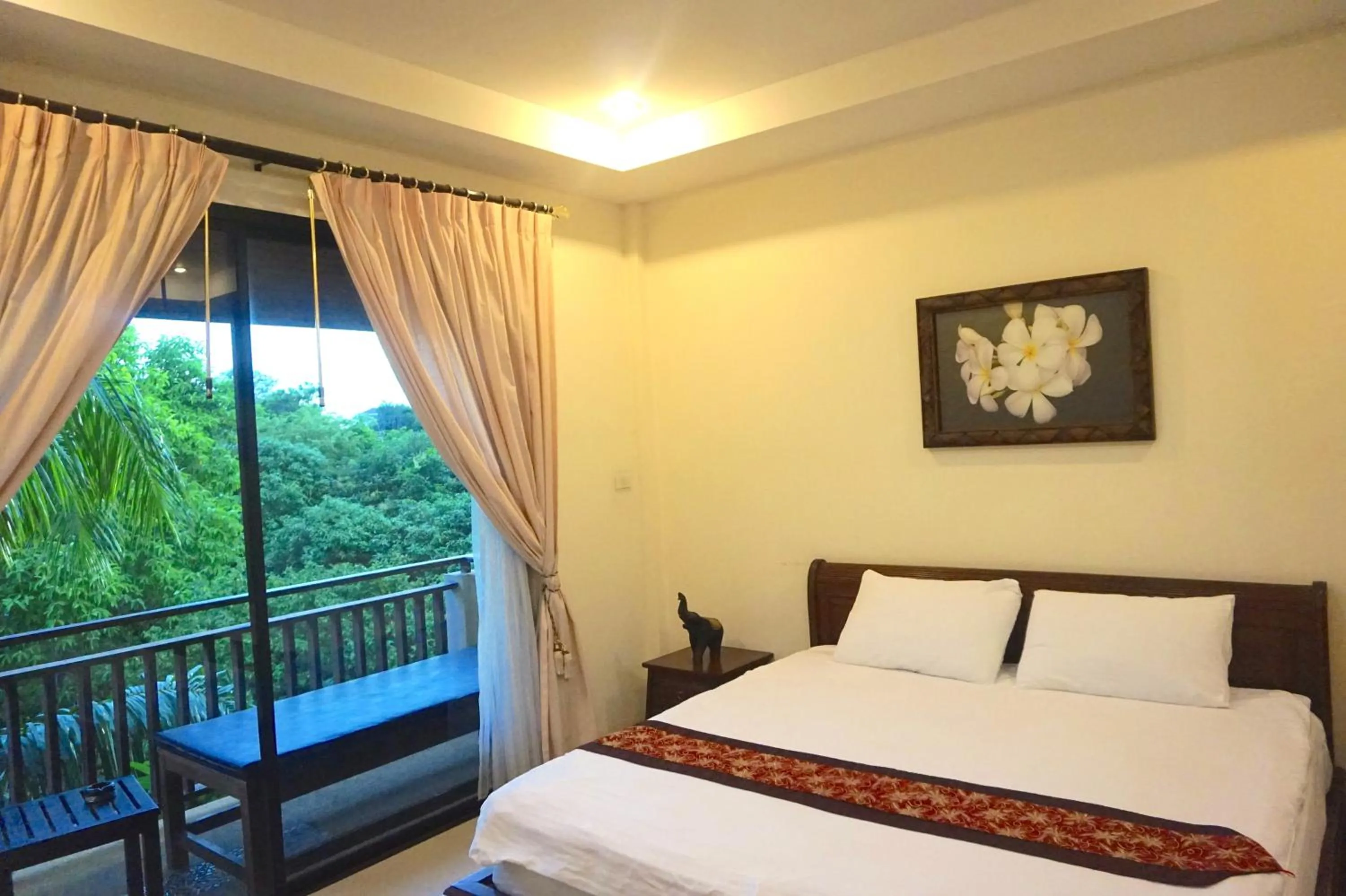 Bed in Thai Pura Resort