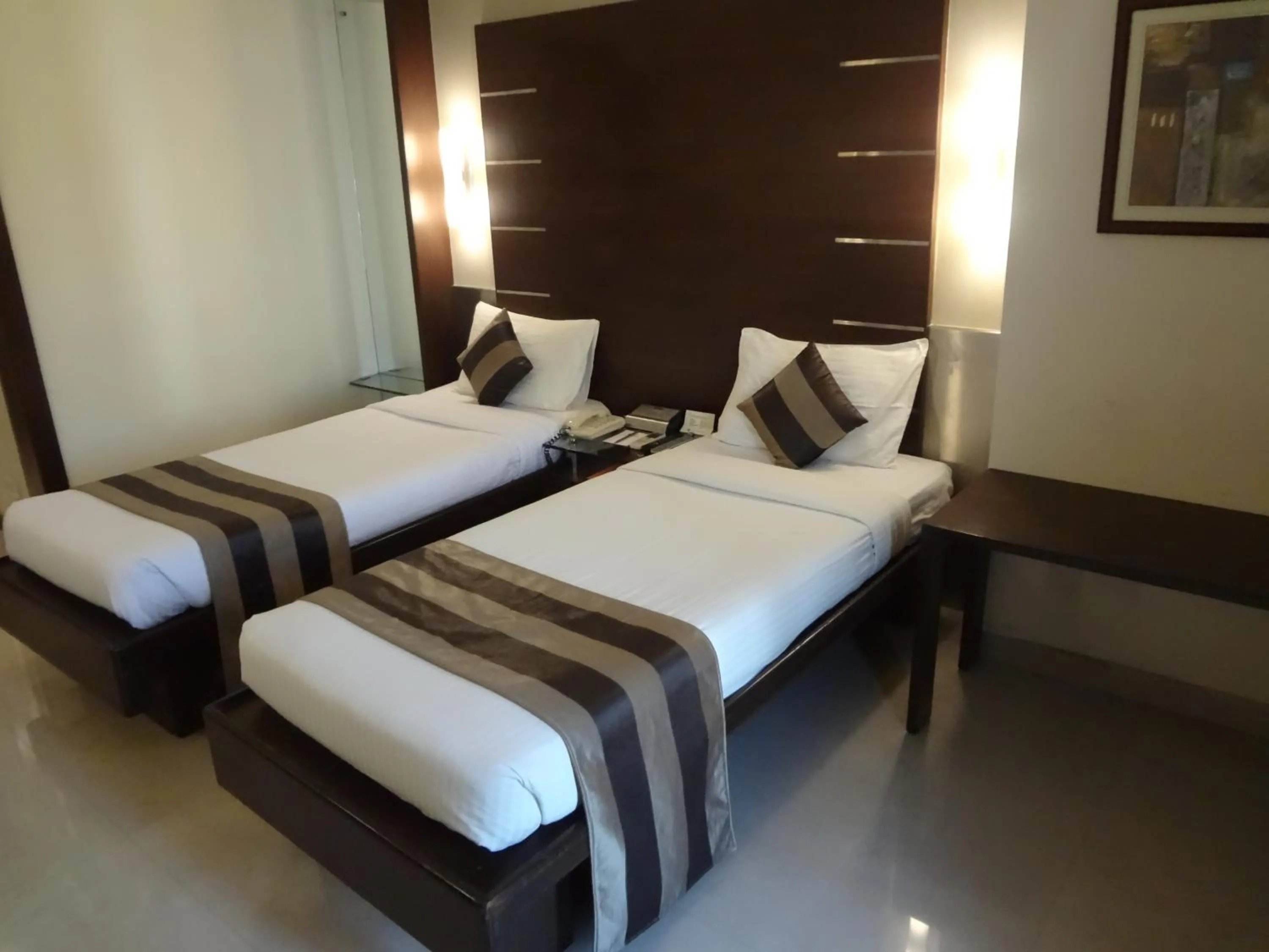 Photo of the whole room, Bed in Hotel Suba Galaxy Mumbai