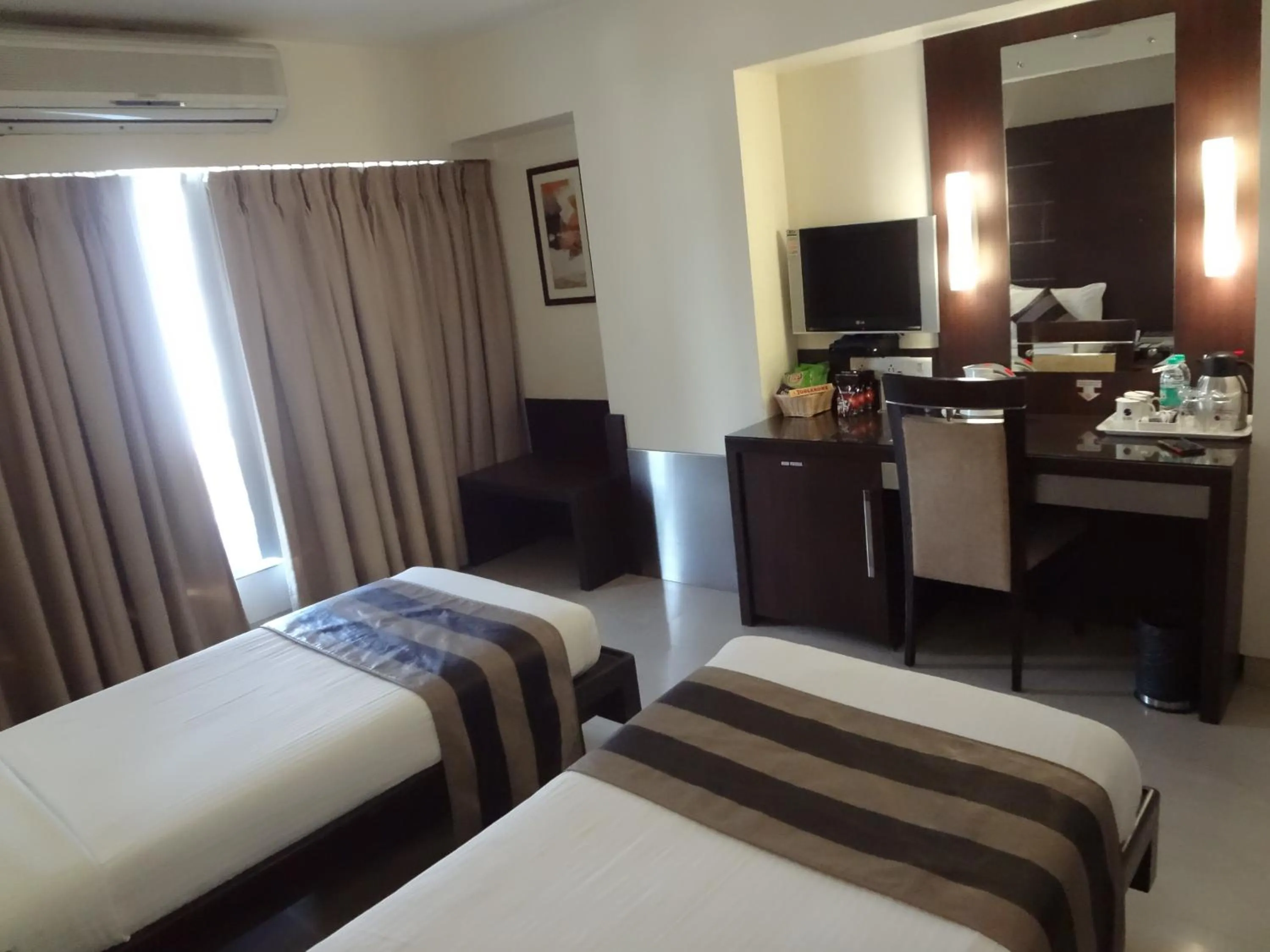 Photo of the whole room, Bed in Hotel Suba Galaxy Mumbai