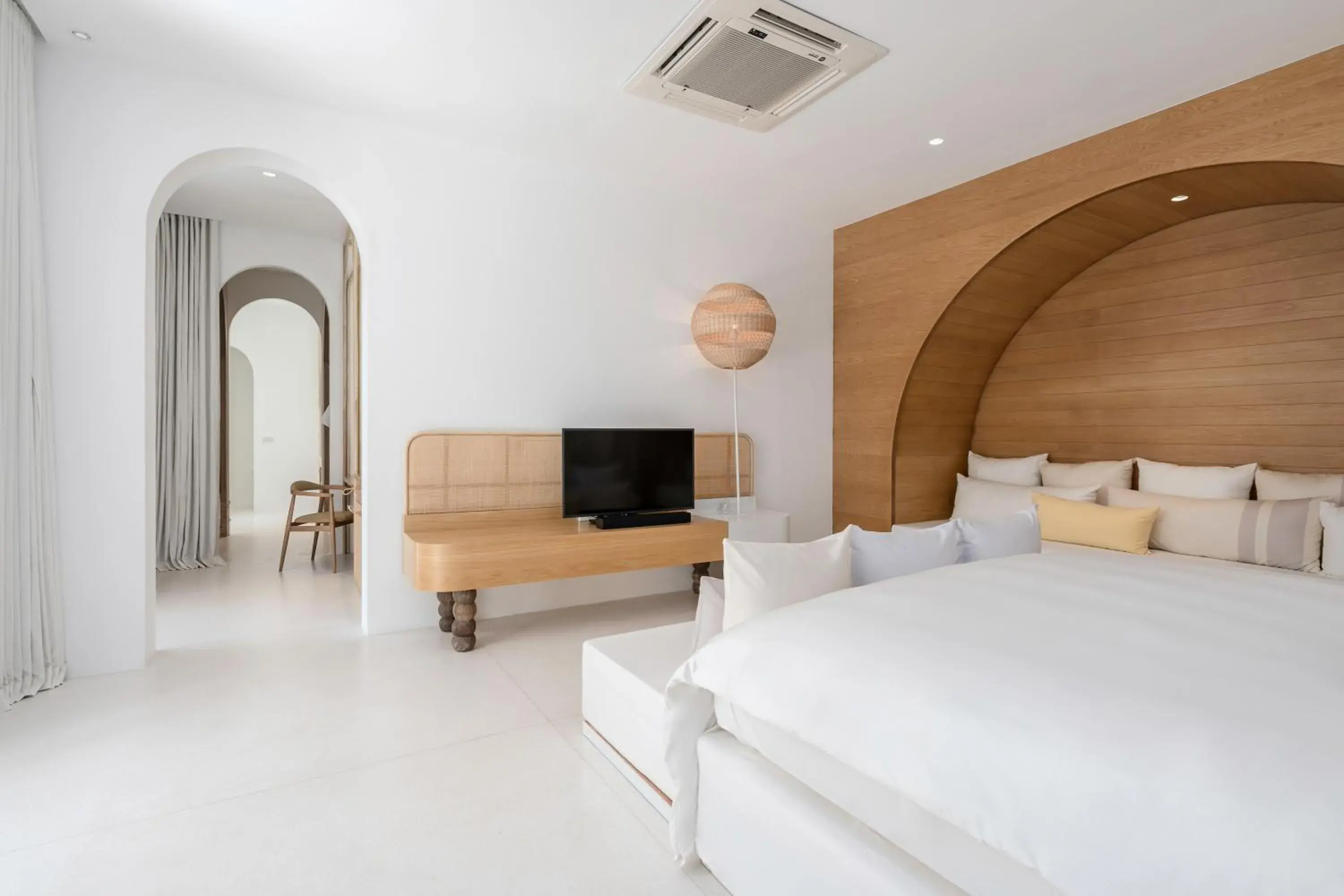 Bed in SALA Samui Chaweng Beach Resort Bed in SALA Samui Chaweng Beach Resort