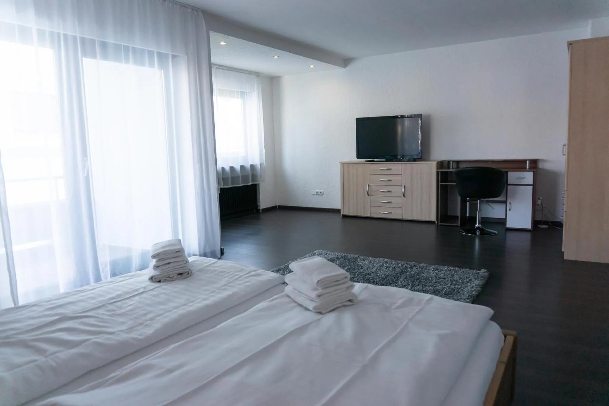 Living room, Bed in Eisberg Gästehaus & De Luxe Appartements