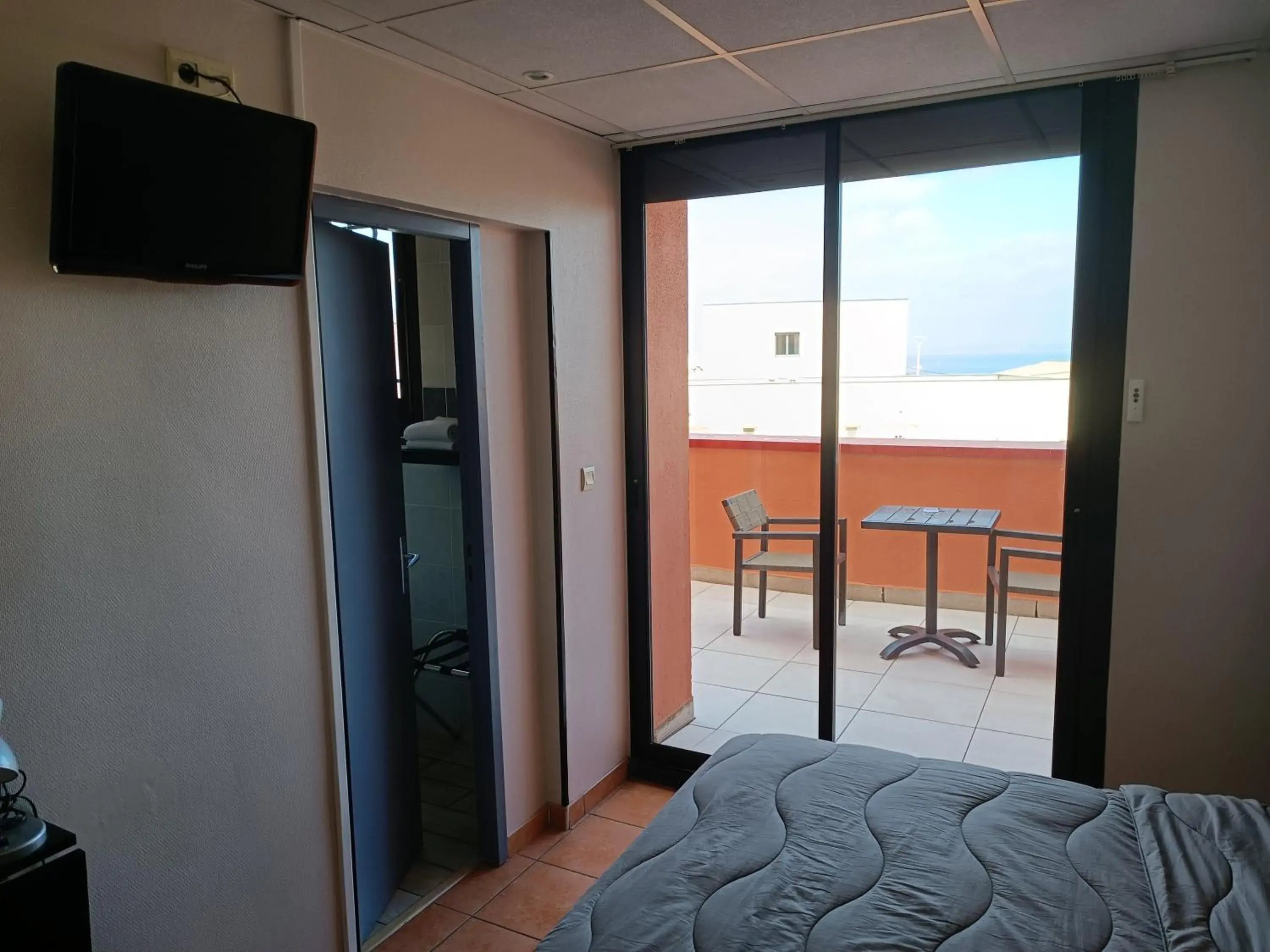 Bed in Hôtel L'Hacienda Bed in Hôtel L'Hacienda