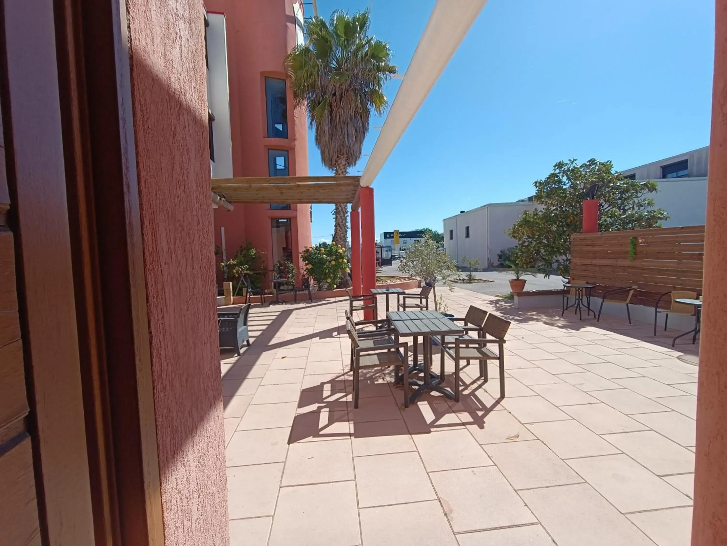 Property building in Hôtel L'Hacienda Property building in Hôtel L'Hacienda