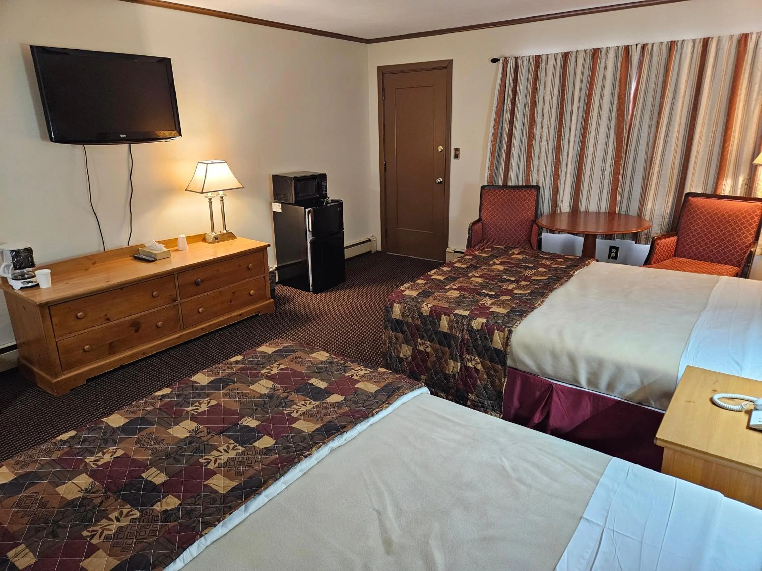 Bed in Alpenhaus Motel