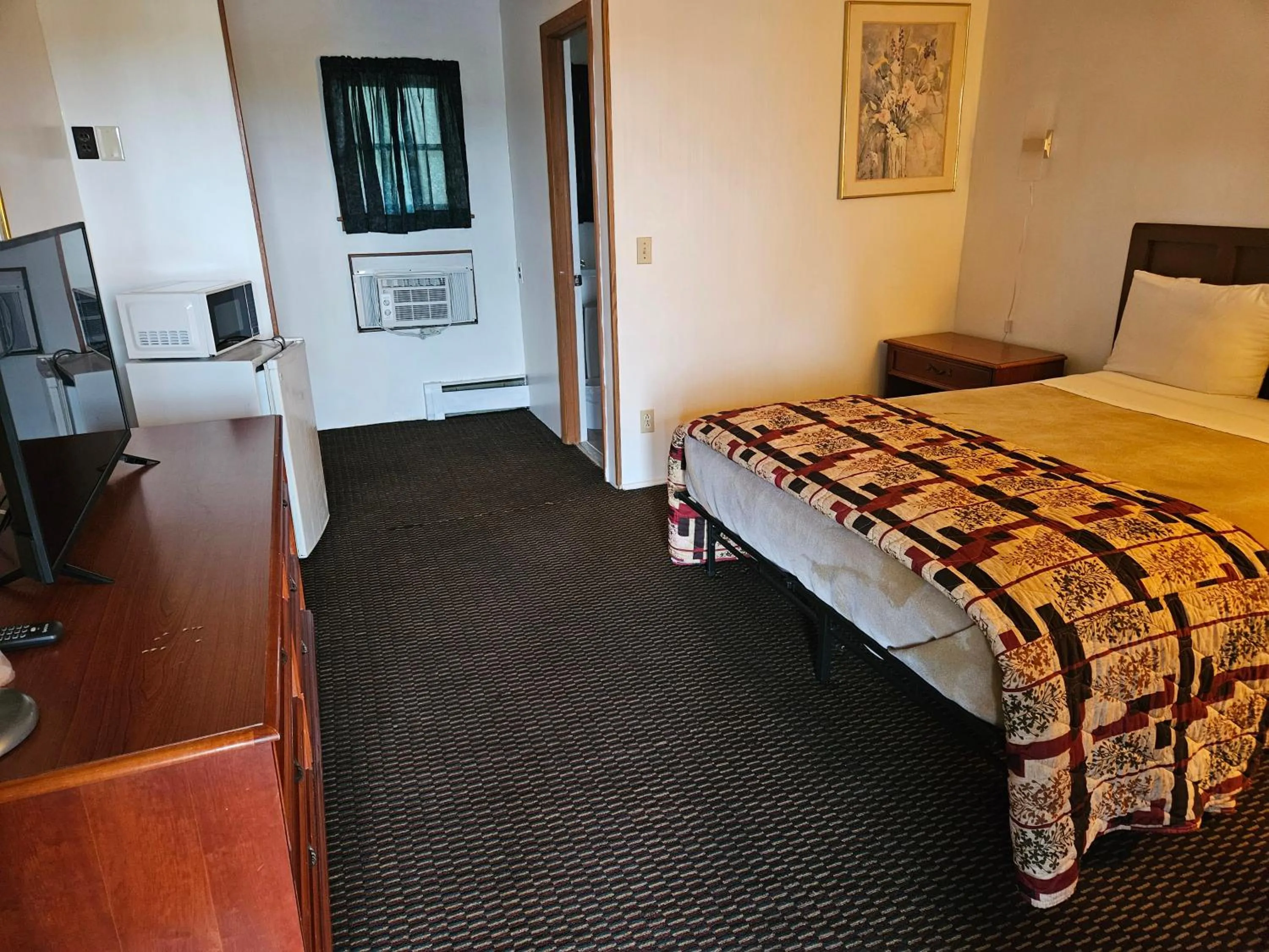 Bed in Alpenhaus Motel