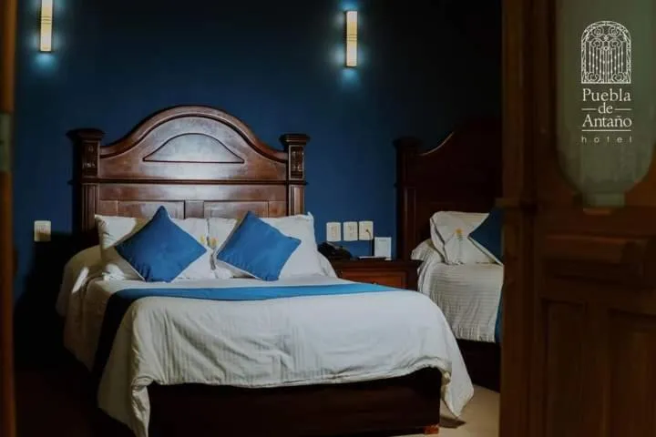 Bed in Hotel Puebla de Antaño