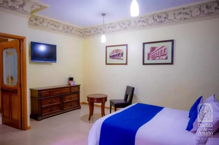 Bed in Hotel Puebla de Antaño