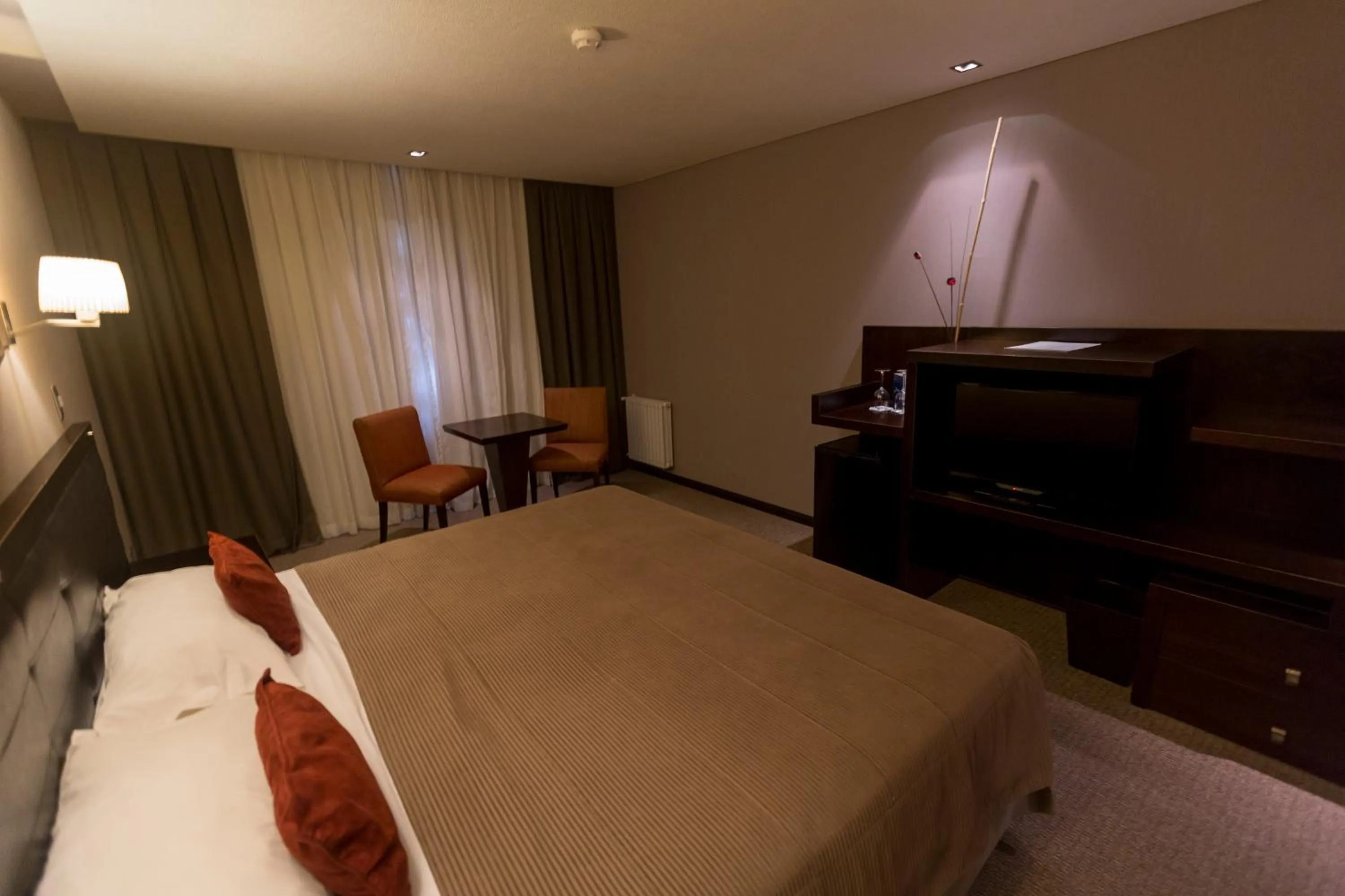 Bed in Imago Hotel & Spa