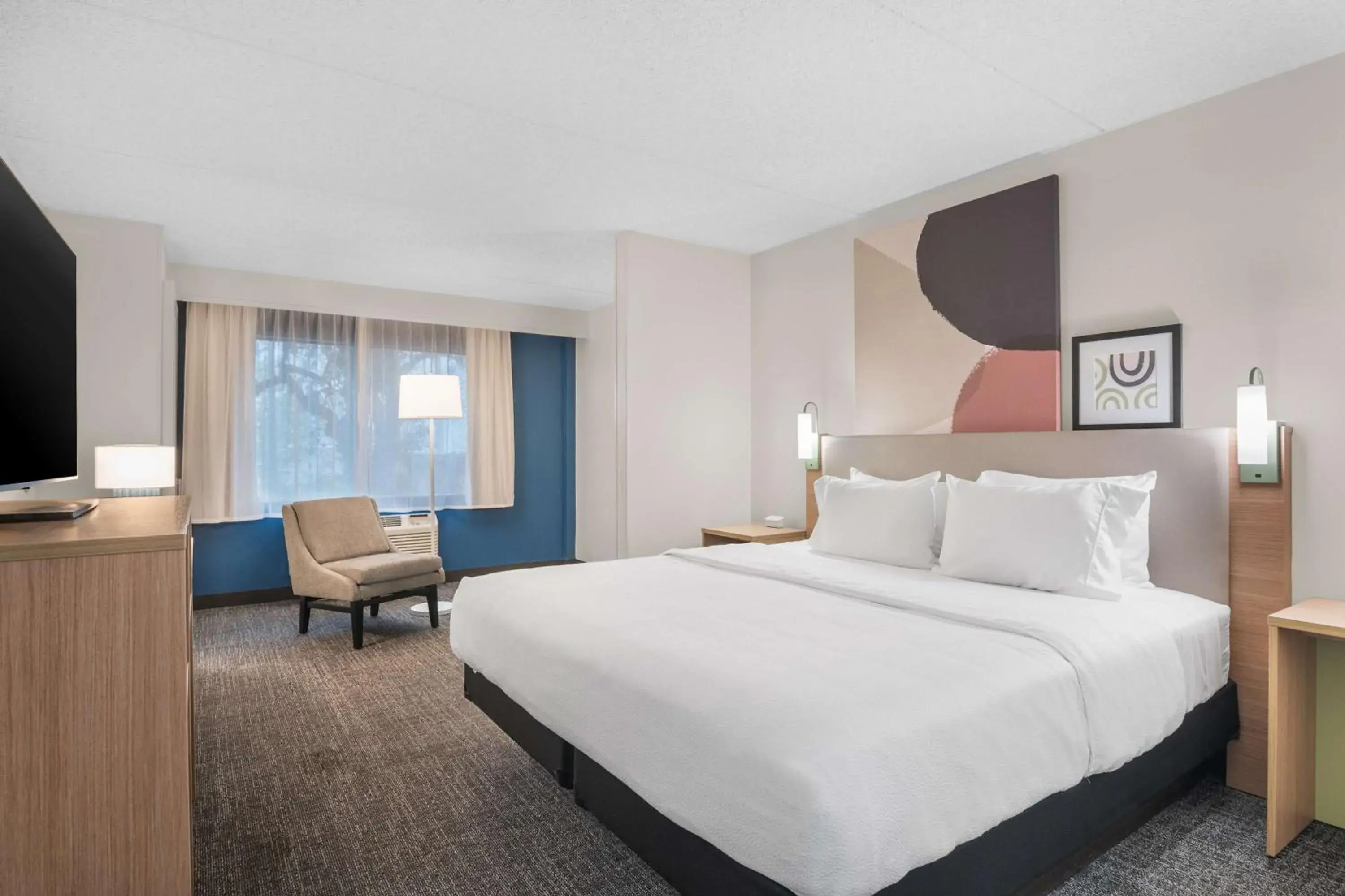 Bed in Spark By Hilton St. Augustine Historic District Bed in Spark By Hilton St. Augustine Historic District