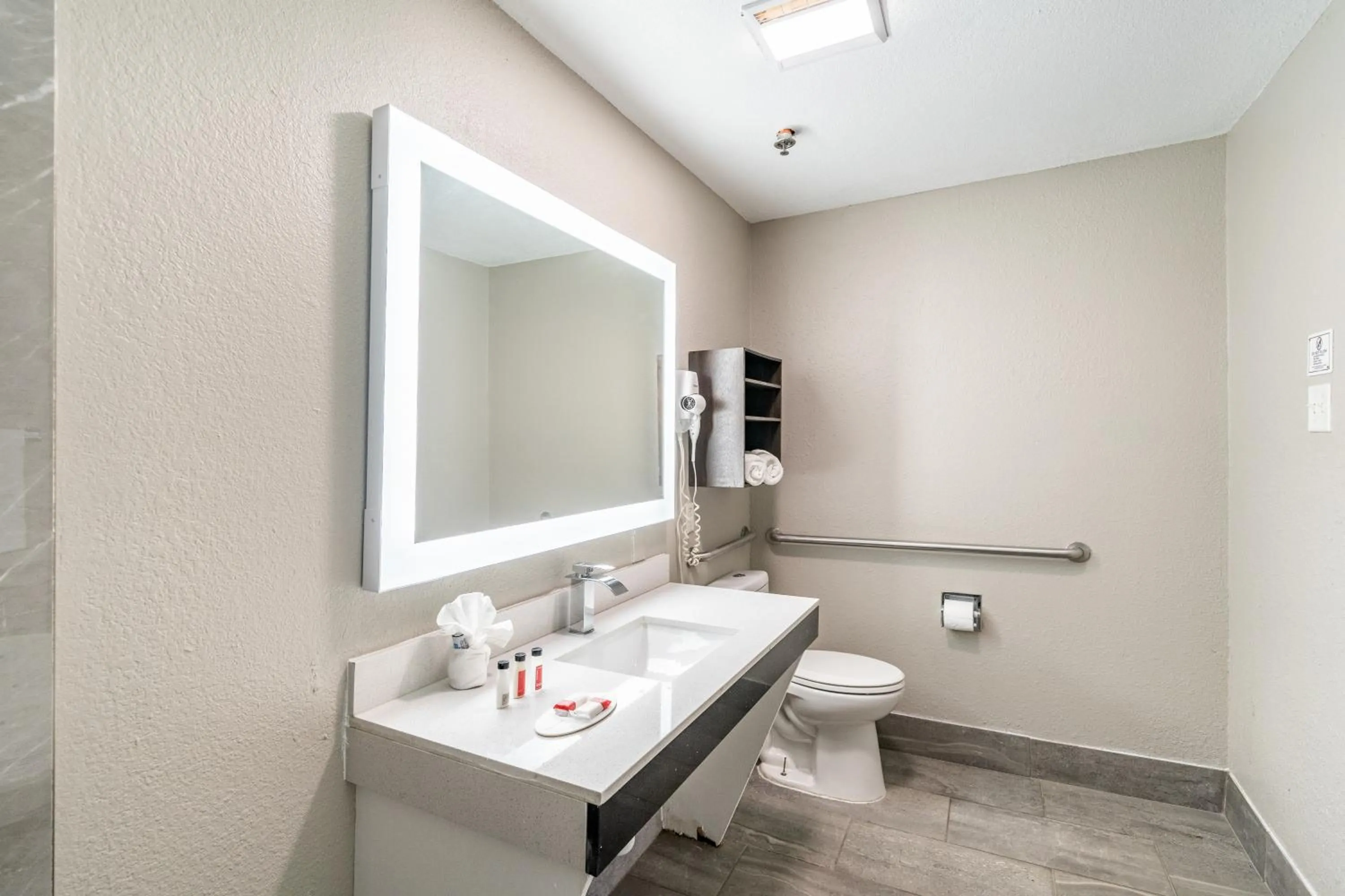 Toilet in Super 8 by Wyndham San Antonio/Riverwalk Area