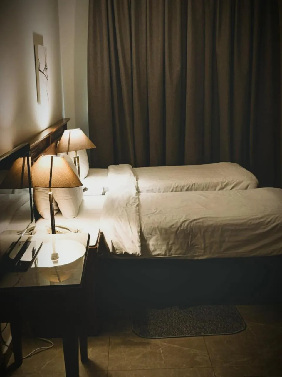 Bed in Kindi Suite Hotel