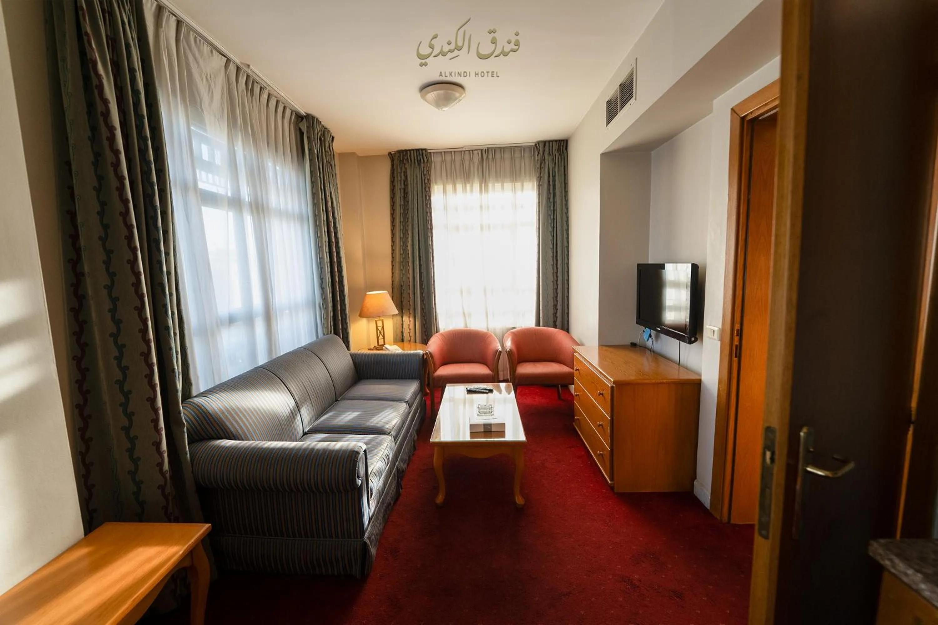 Bed in Kindi Suite Hotel