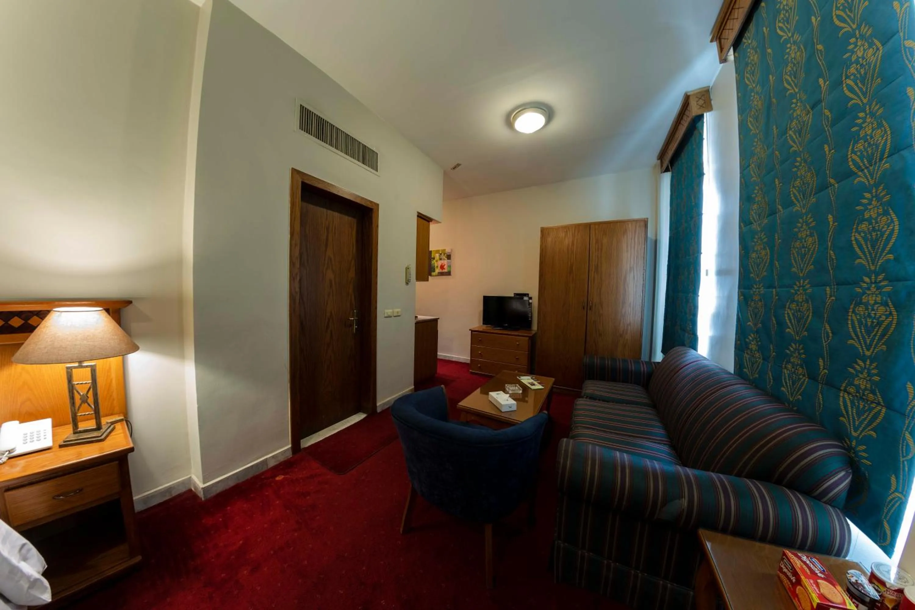 Bed in Kindi Suite Hotel