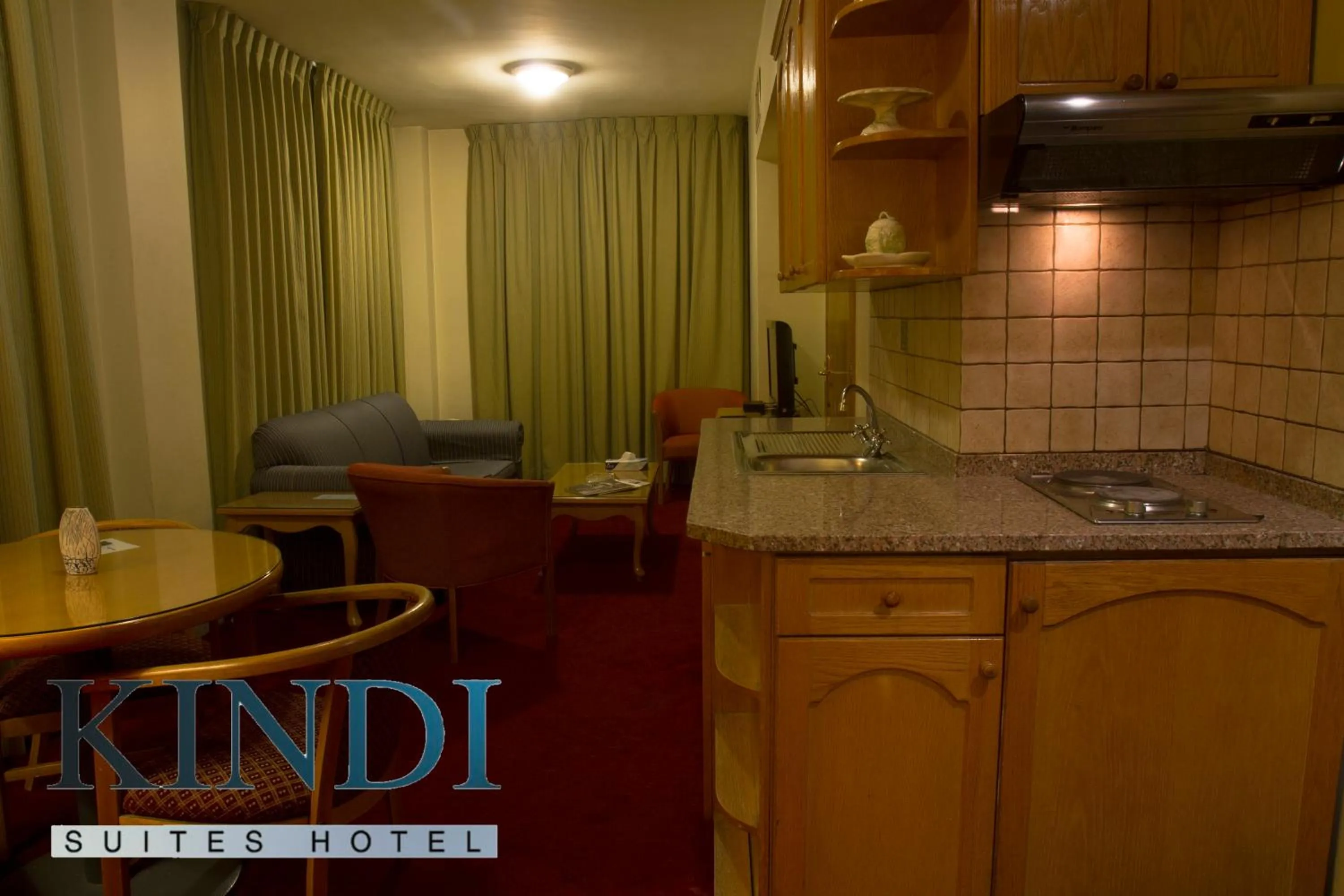 Kitchen or kitchenette in Kindi Suite Hotel