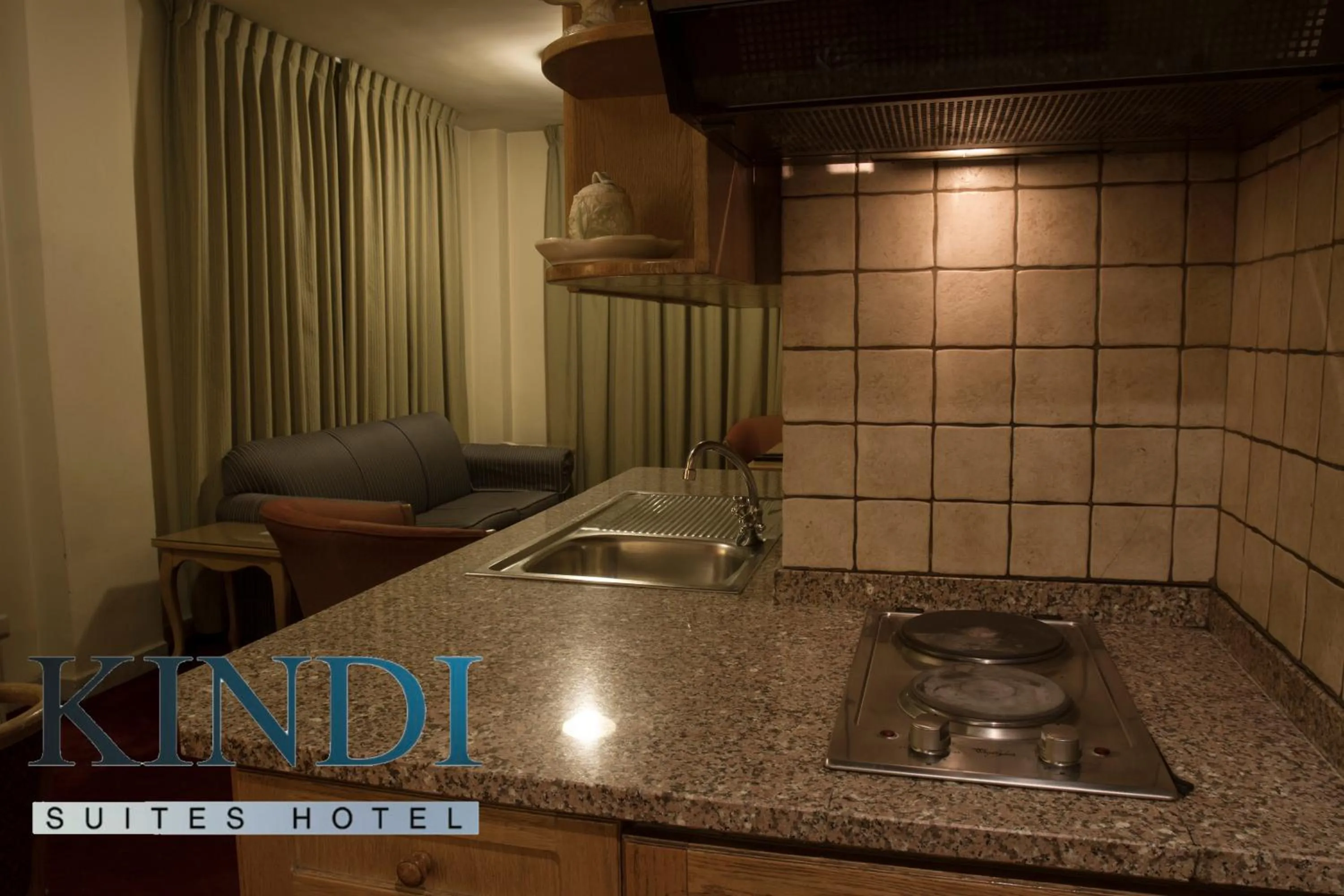 Kitchen or kitchenette in Kindi Suite Hotel