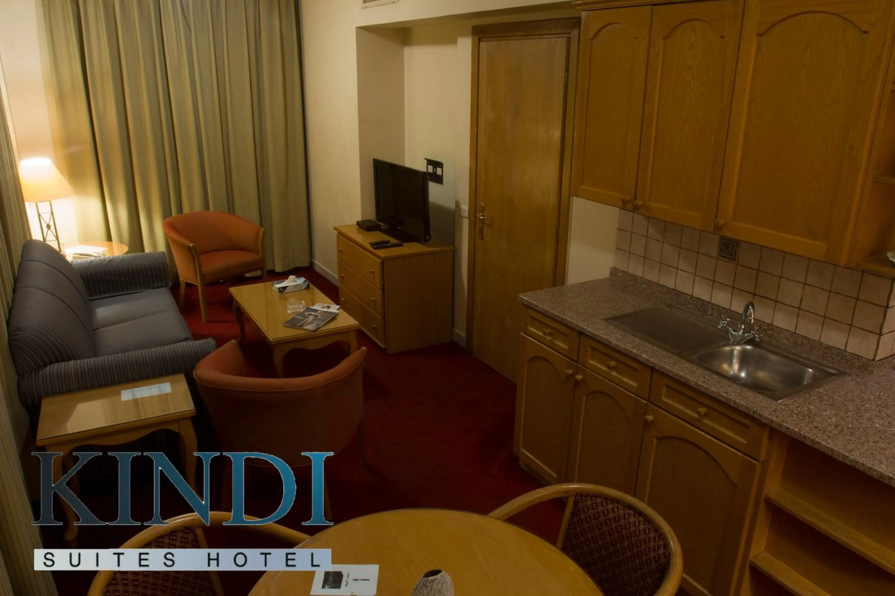 Kitchen or kitchenette in Kindi Suite Hotel