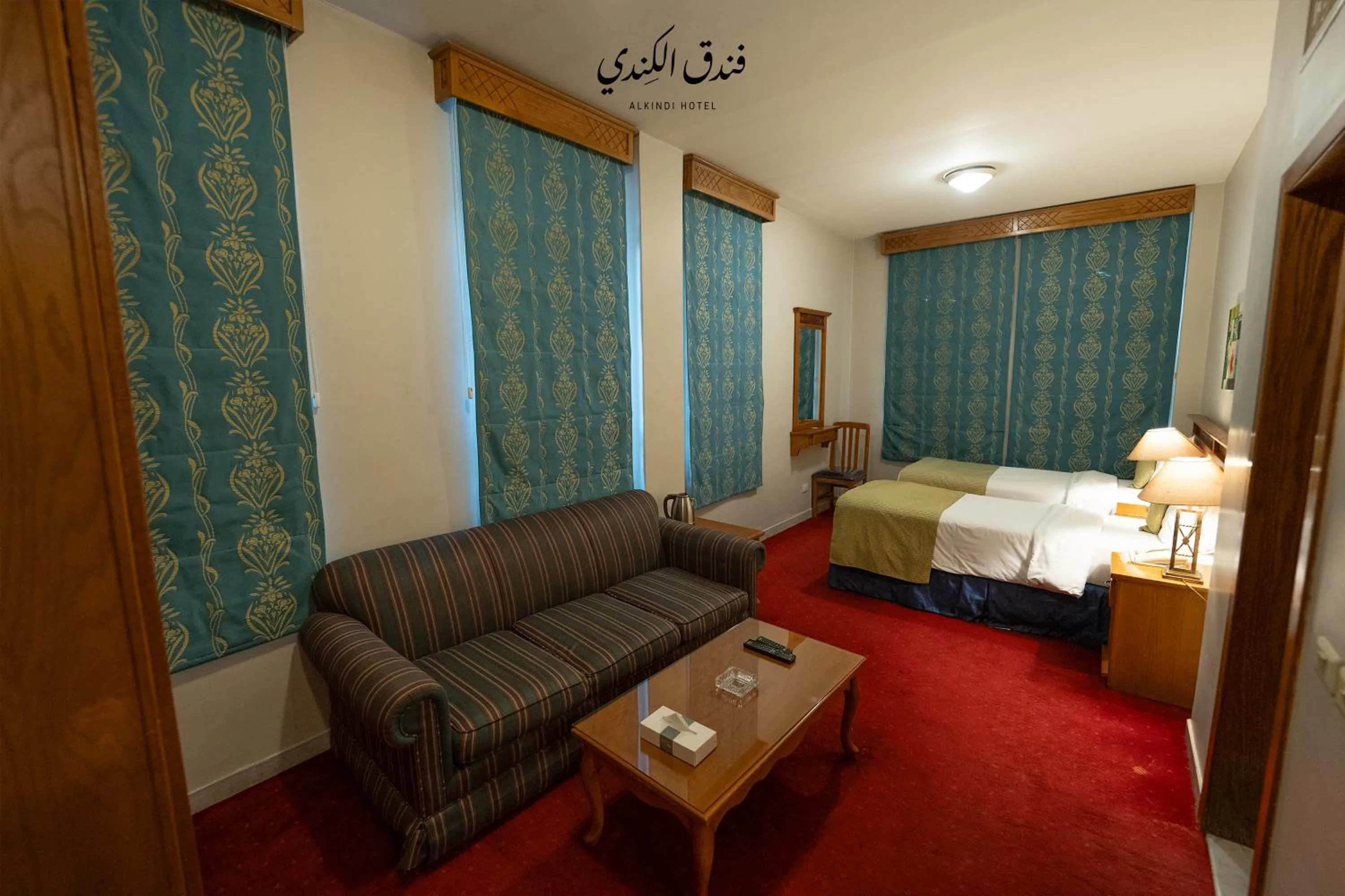 Bed in Kindi Suite Hotel