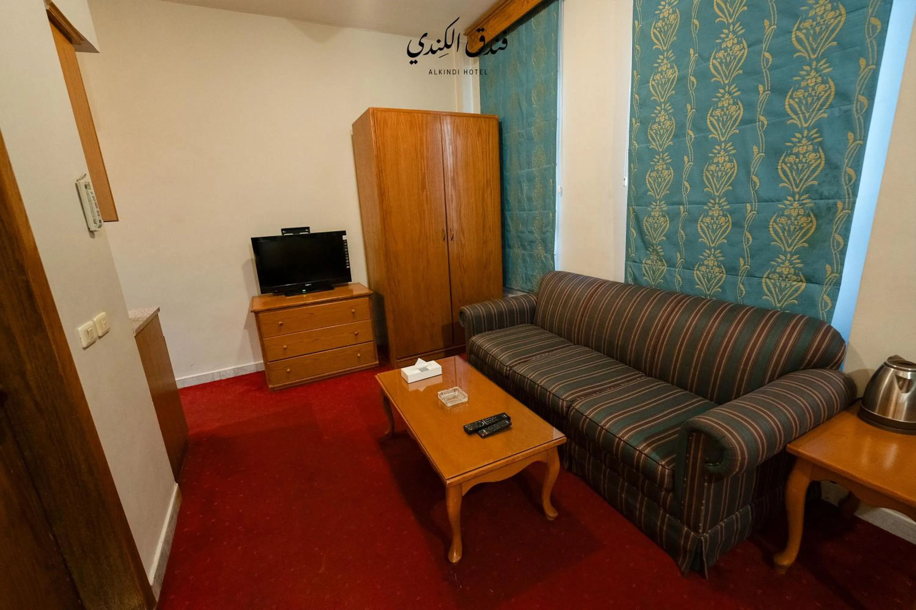 Seating area in Kindi Suite Hotel