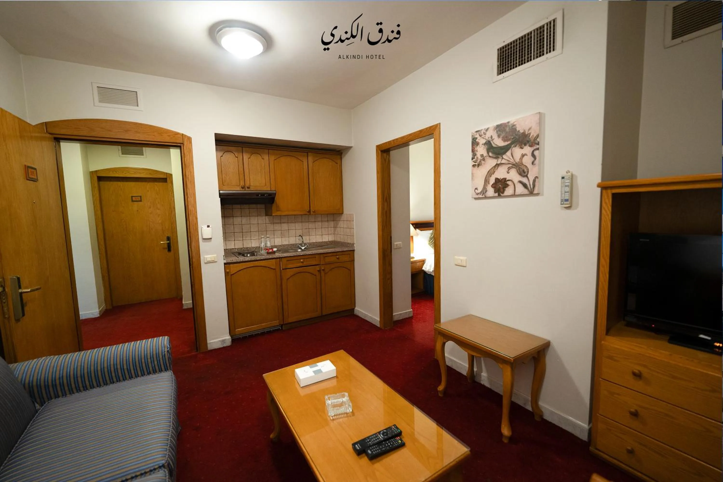 Kitchen or kitchenette in Kindi Suite Hotel