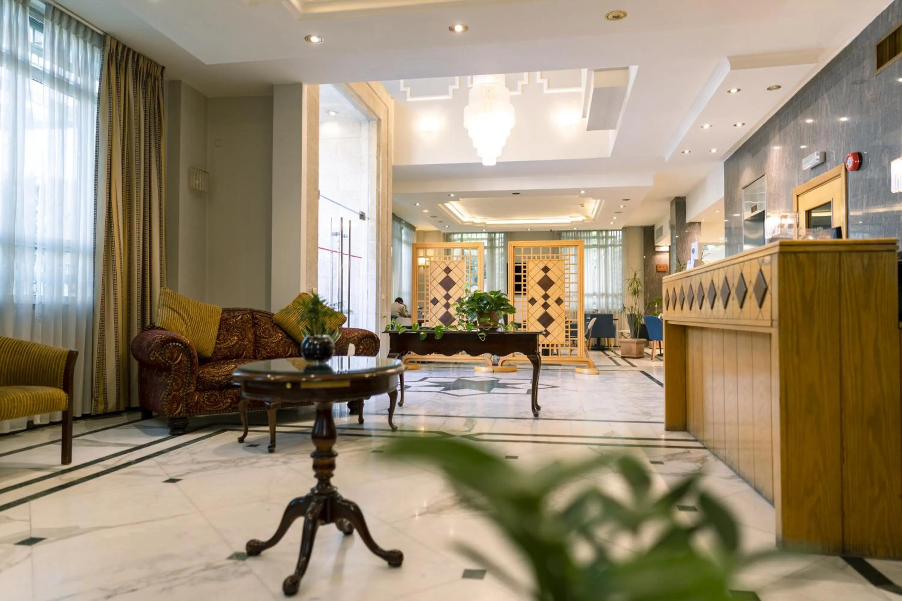 Lobby or reception in Kindi Suite Hotel