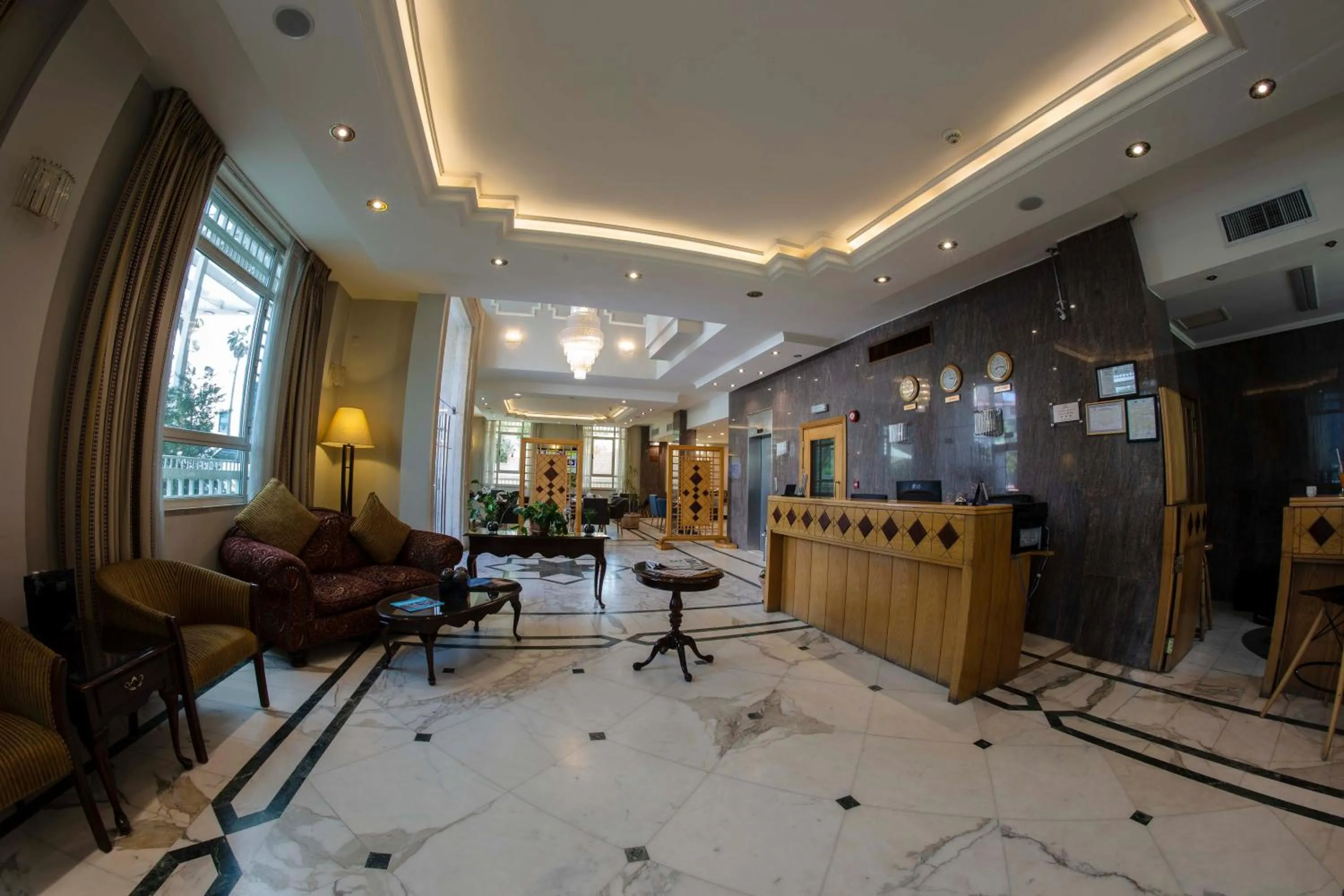 Lobby or reception in Kindi Suite Hotel