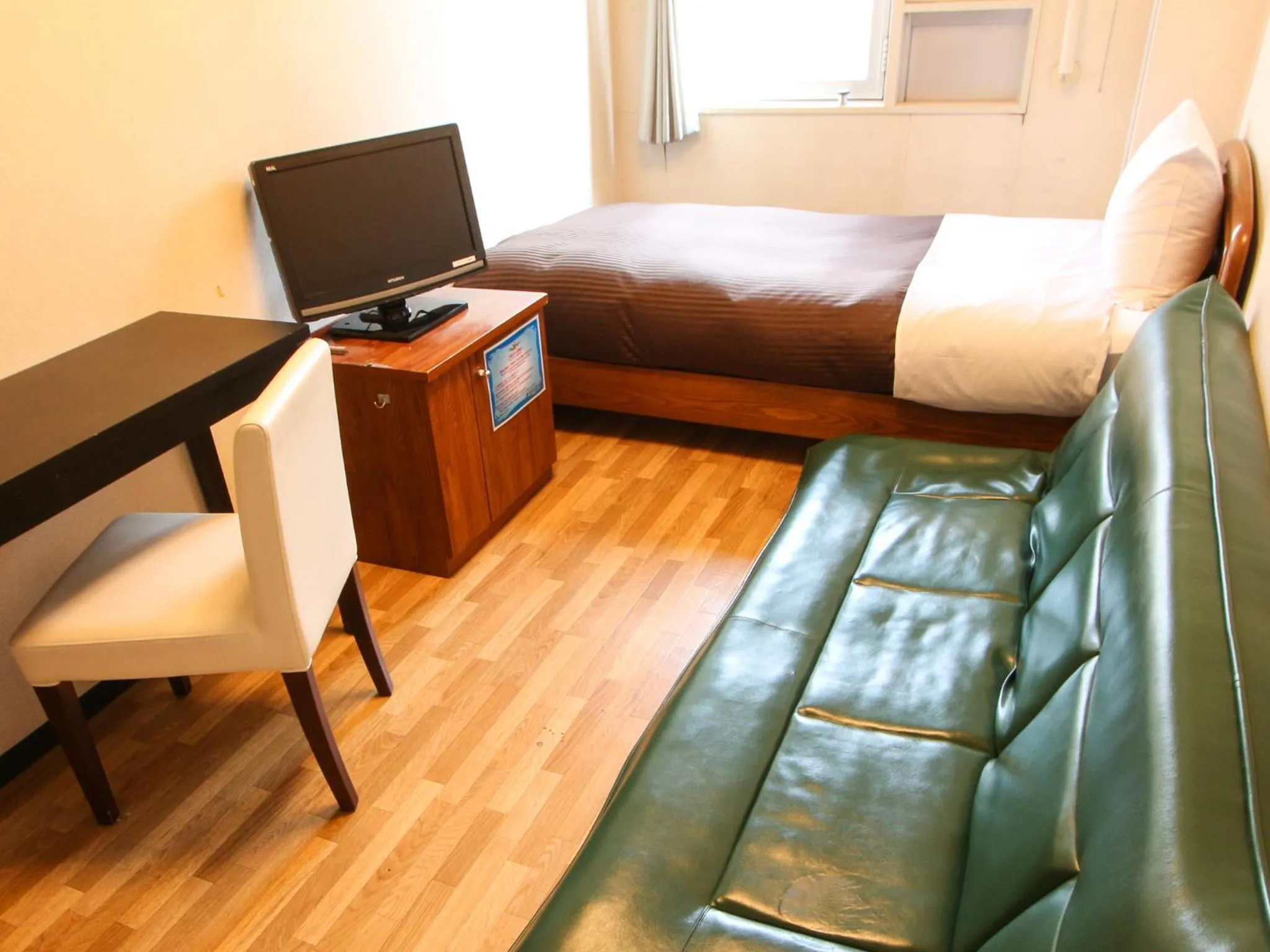 Bed in HOTEL LiVEMAX BUDGET Kawasaki Ekimae