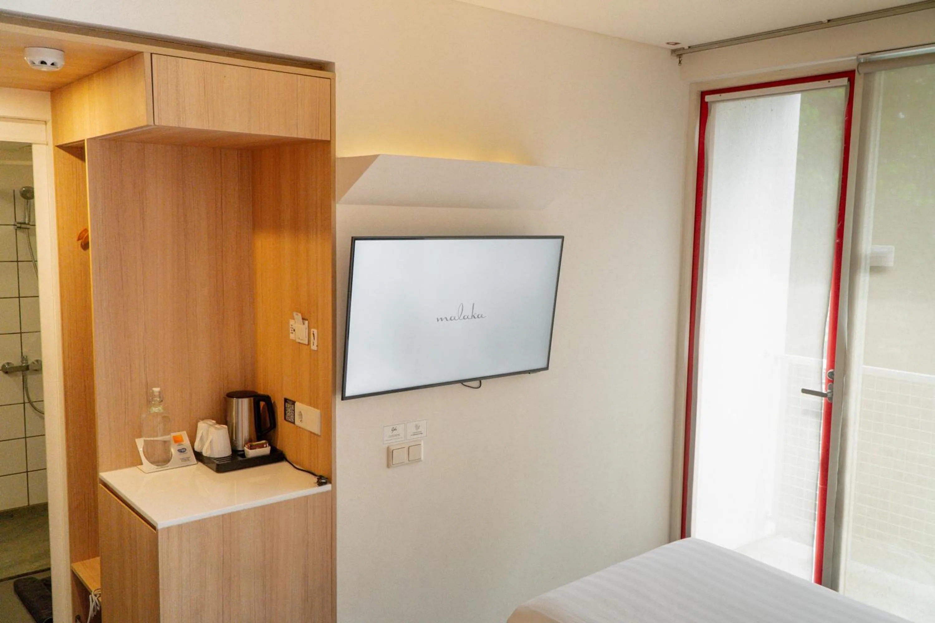 Bed in Malaka Hotel Bandung