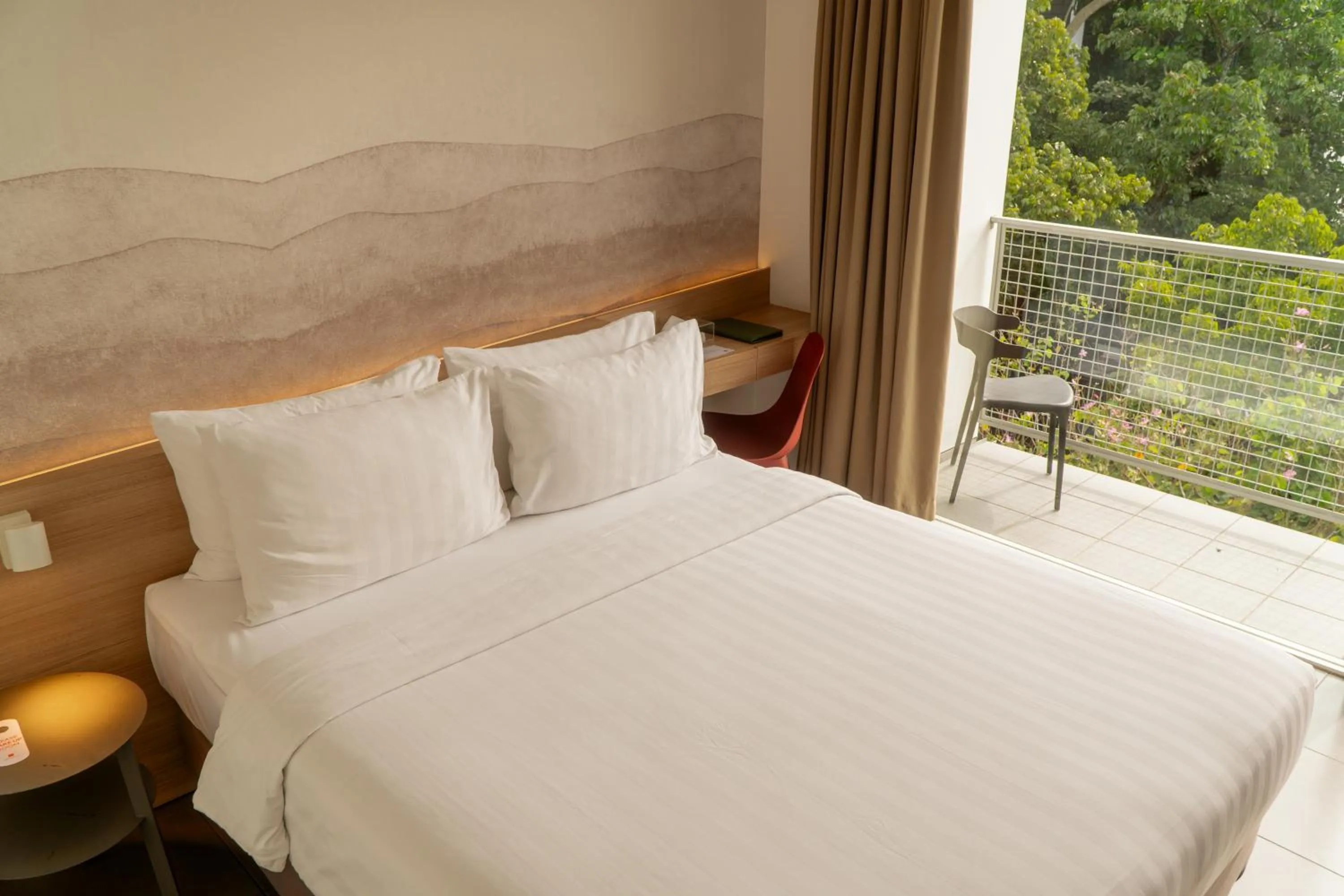 Bed in Malaka Hotel Bandung