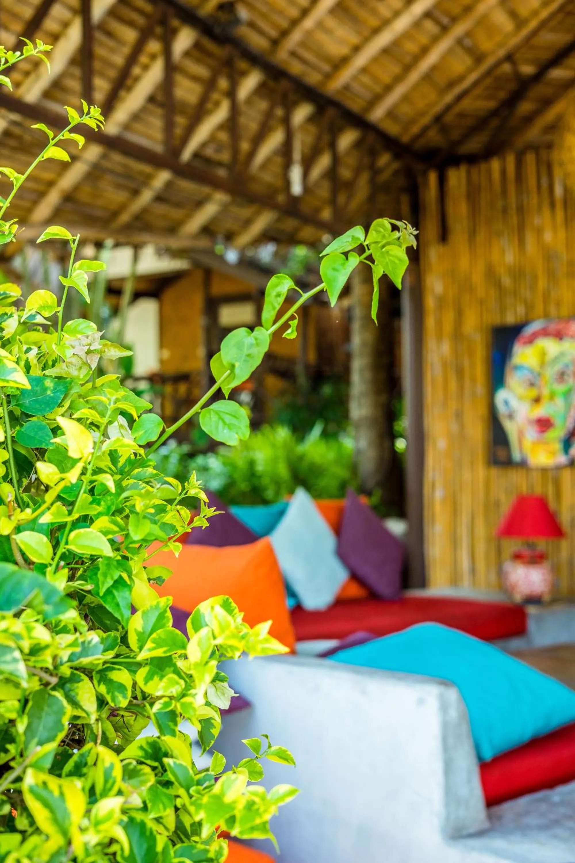 Seating area, Bed in Secret Garden Beach Resort