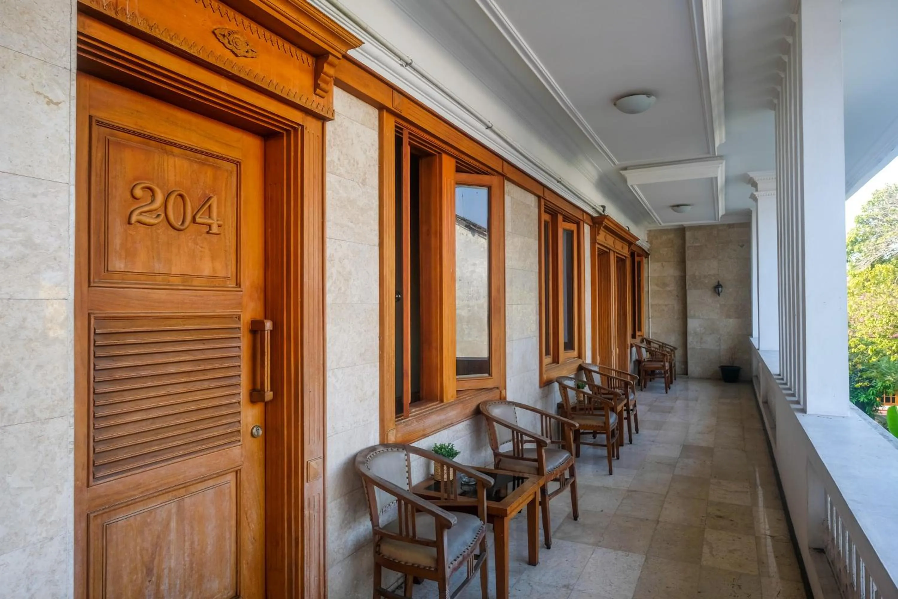 Seating area in Urbanview Omah Pari Boutique Hotel