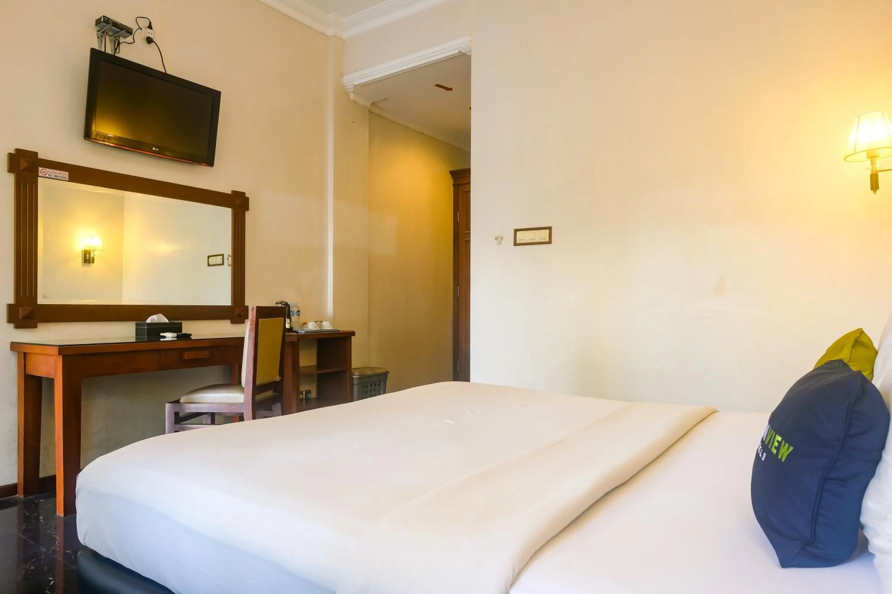Bedroom, Bed in Urbanview Omah Pari Boutique Hotel
