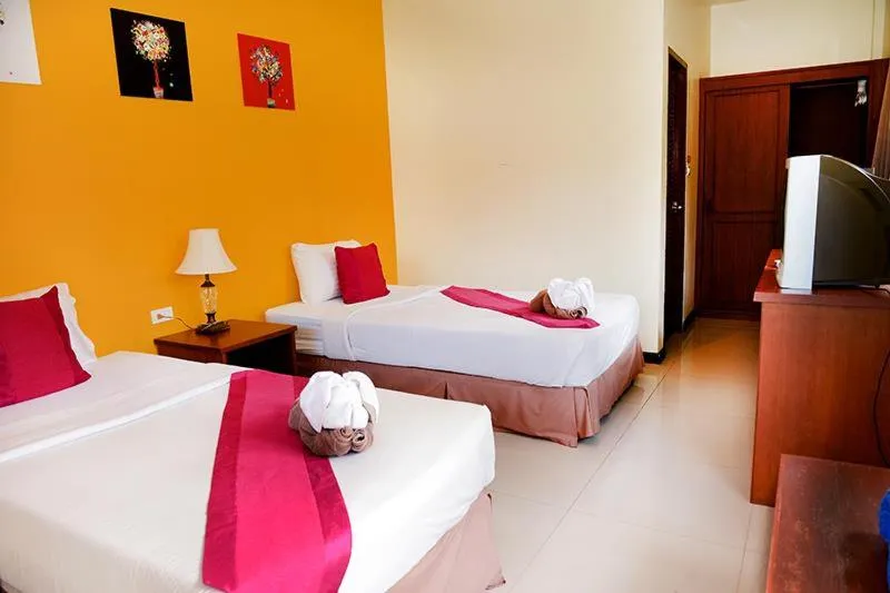 Bed in Samui Mermaid Beachfront