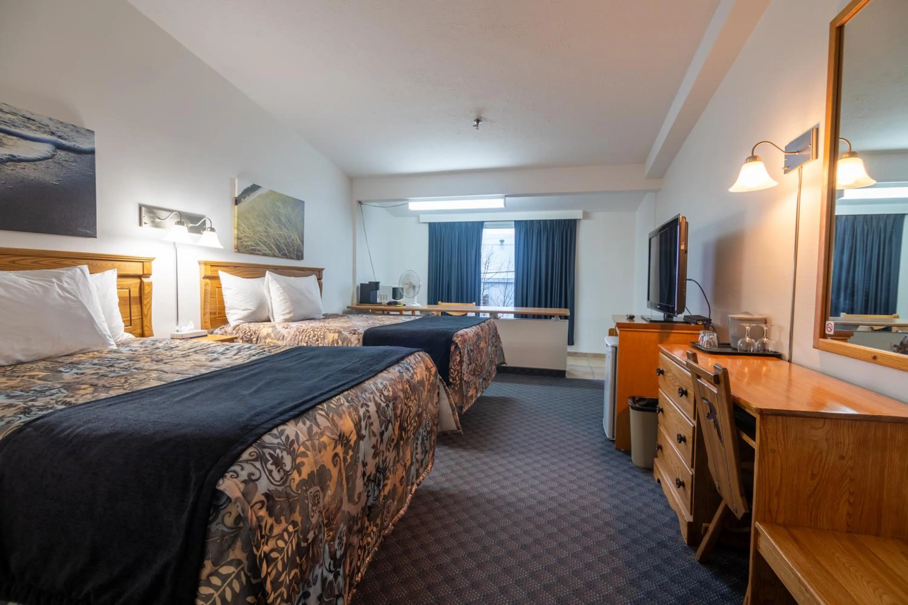 Bedroom in Hôtel Les Mouettes