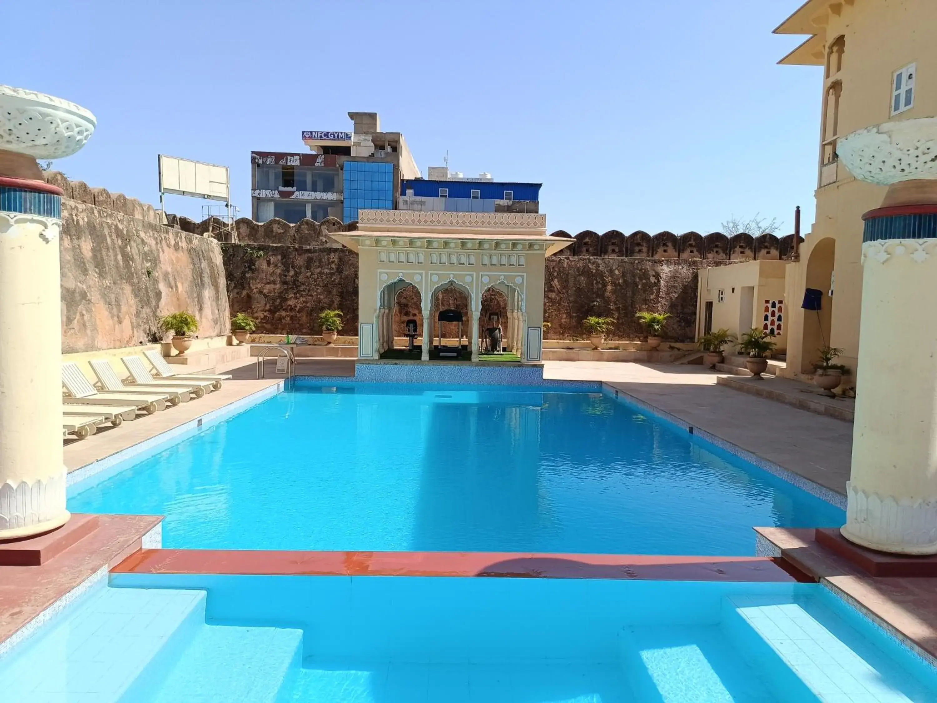 Swimming pool in Chomu Palace Jaipur - A Heritage Hotel Swimming pool in Chomu Palace Jaipur - A Heritage Hotel