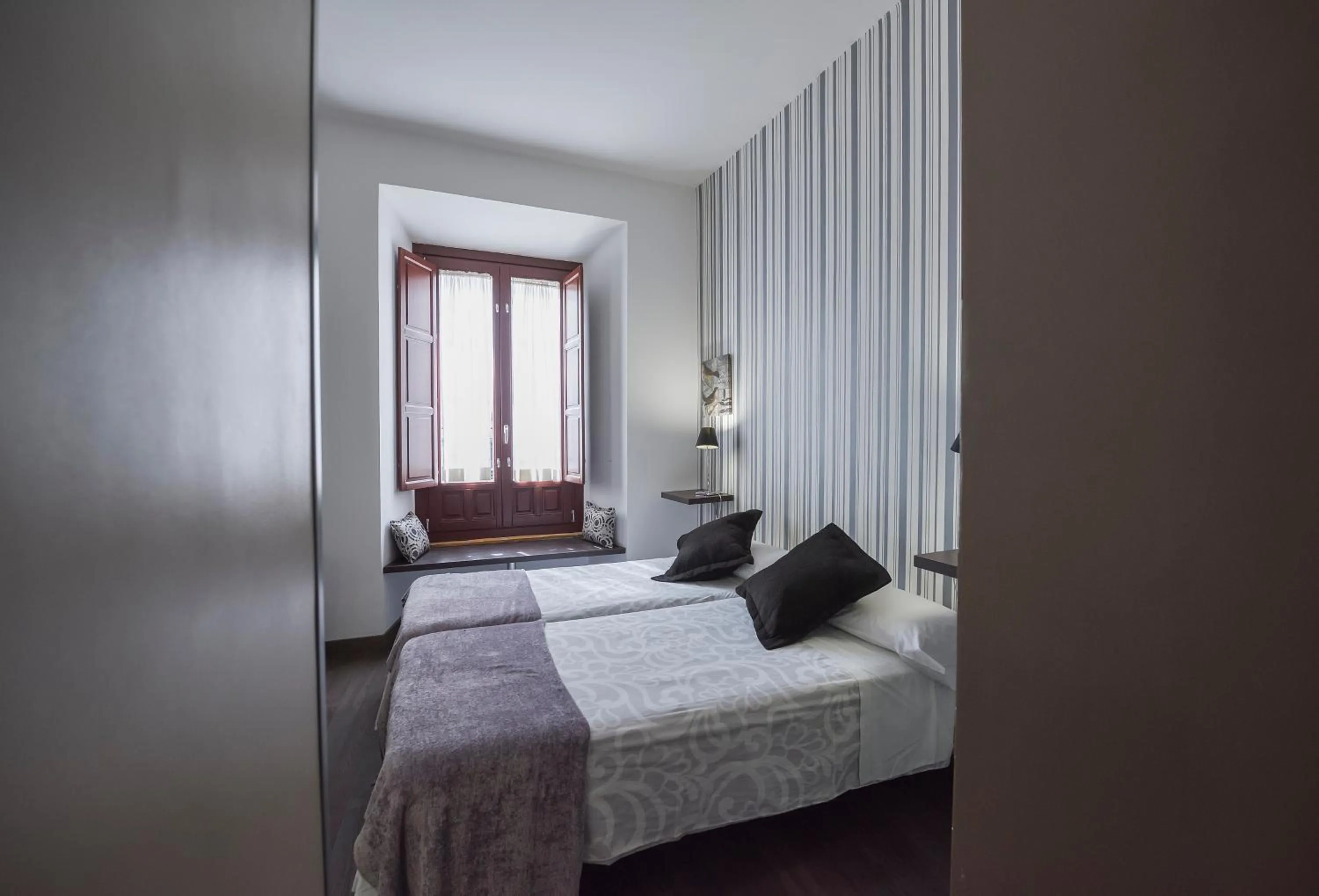 Photo of the whole room, Bed in Alvaro de Torres Boutique