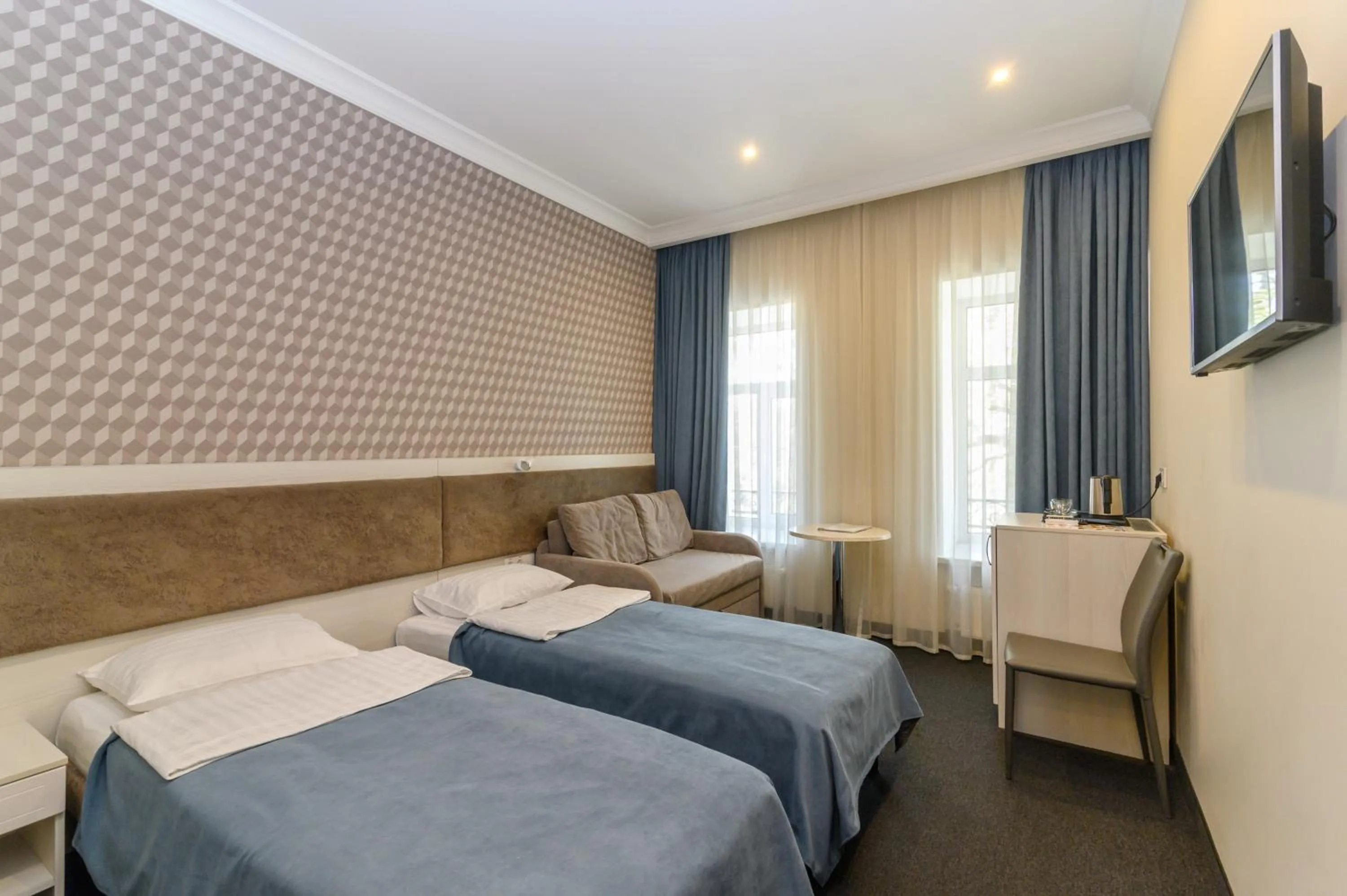 Photo of the whole room, Bed in Voyage