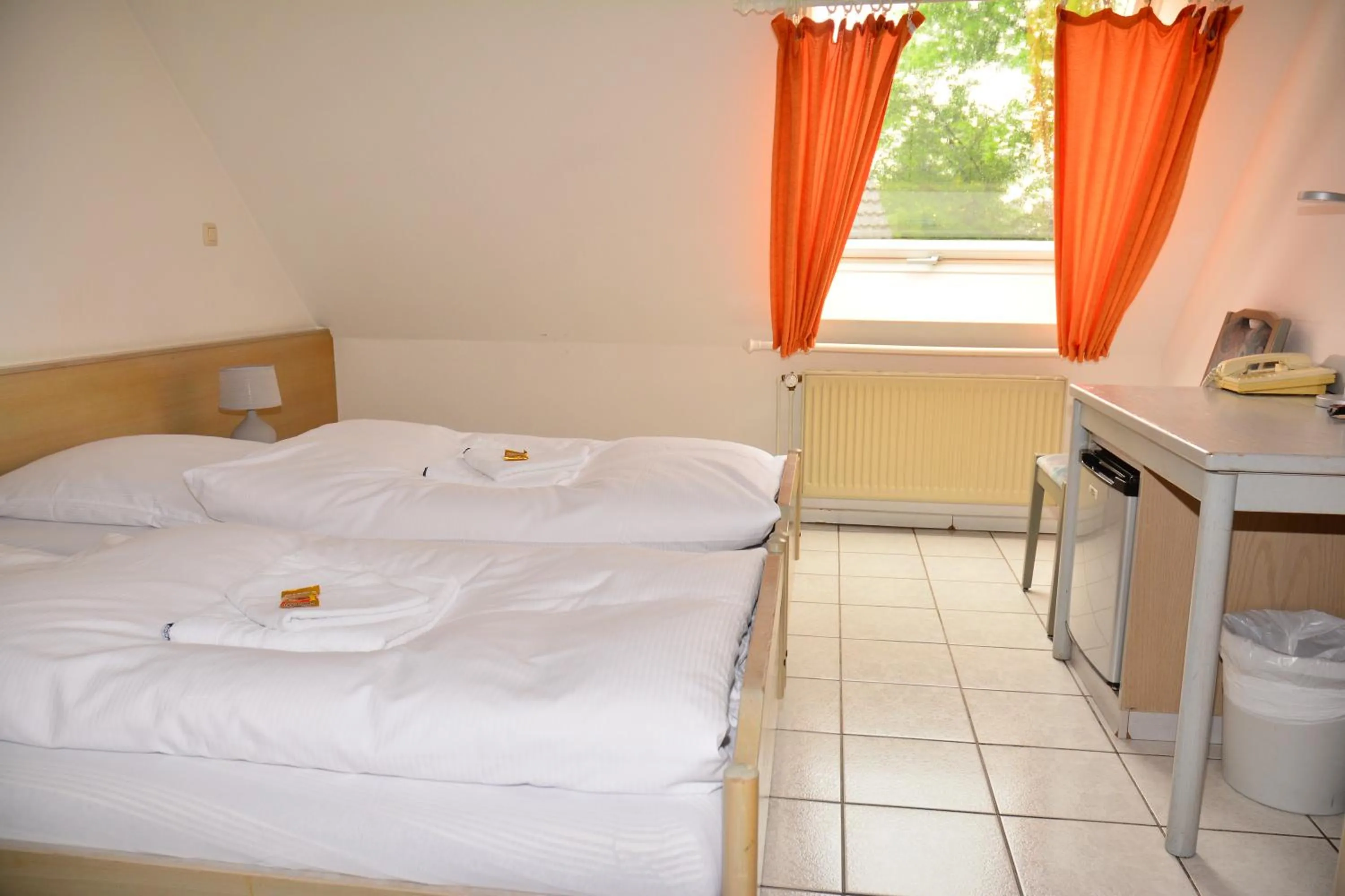 Photo of the whole room, Bed in Hotel Wilhelmshöhe