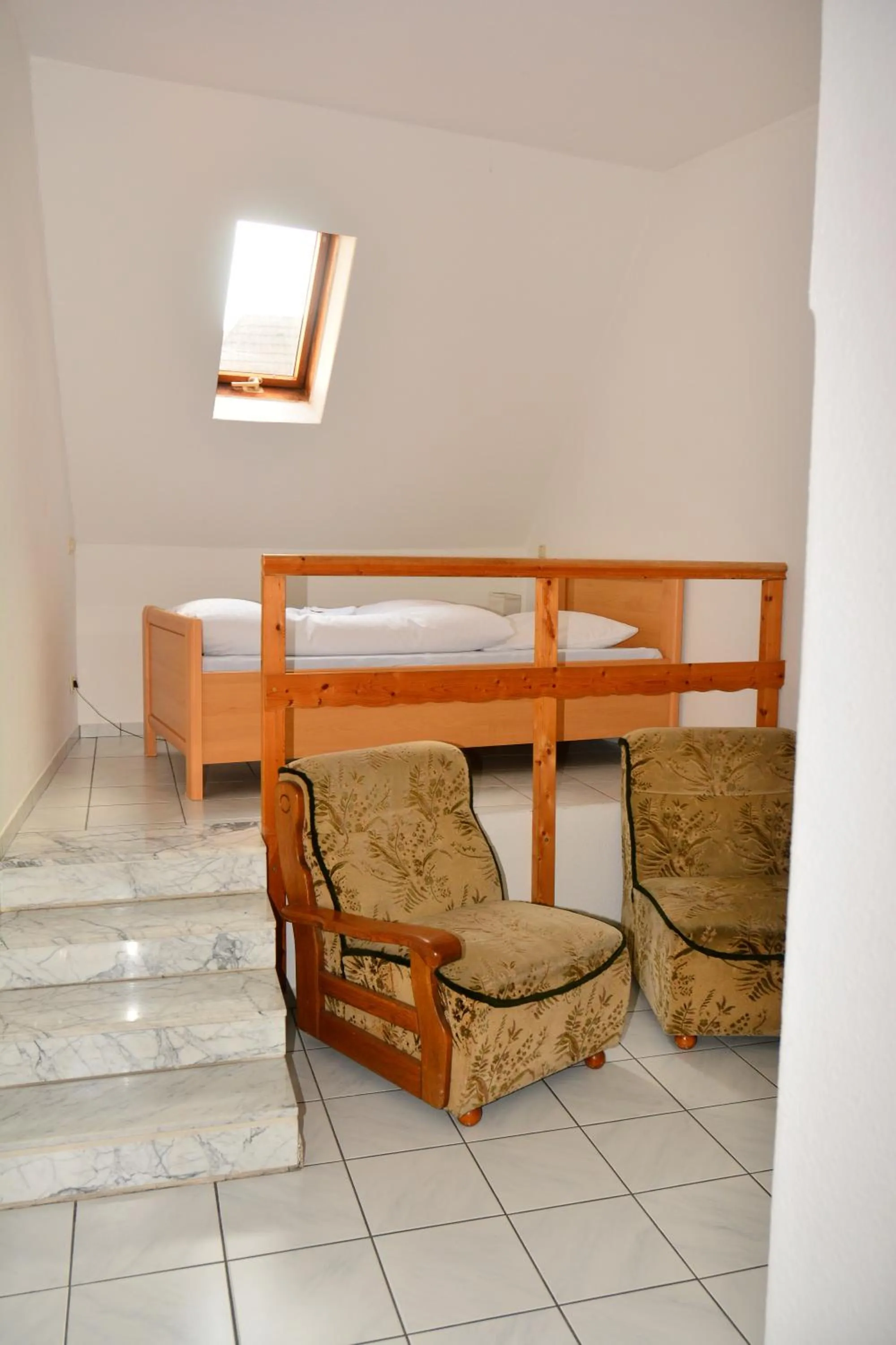 Photo of the whole room, Bed in Hotel Wilhelmshöhe