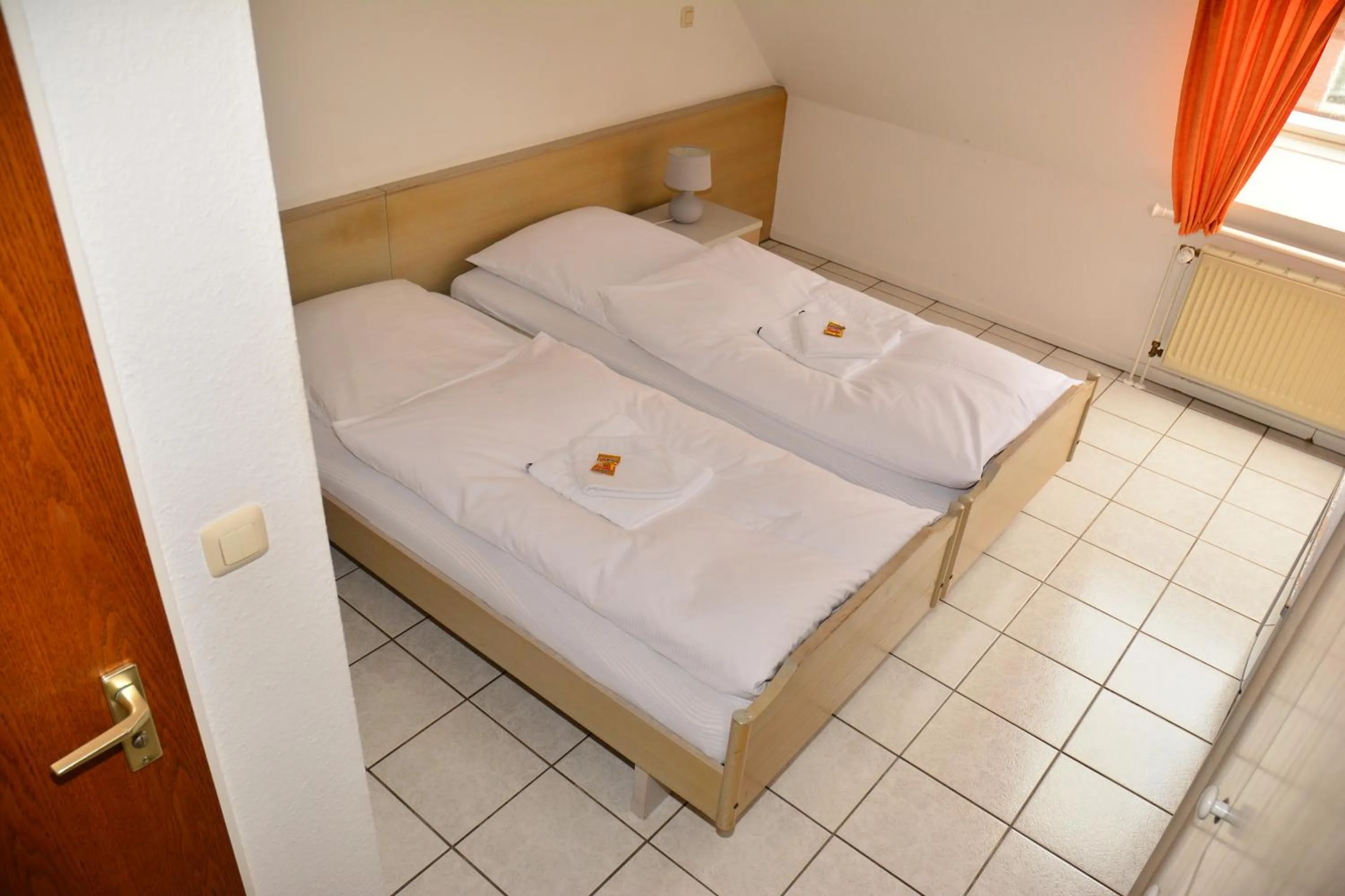 Photo of the whole room, Bed in Hotel Wilhelmshöhe