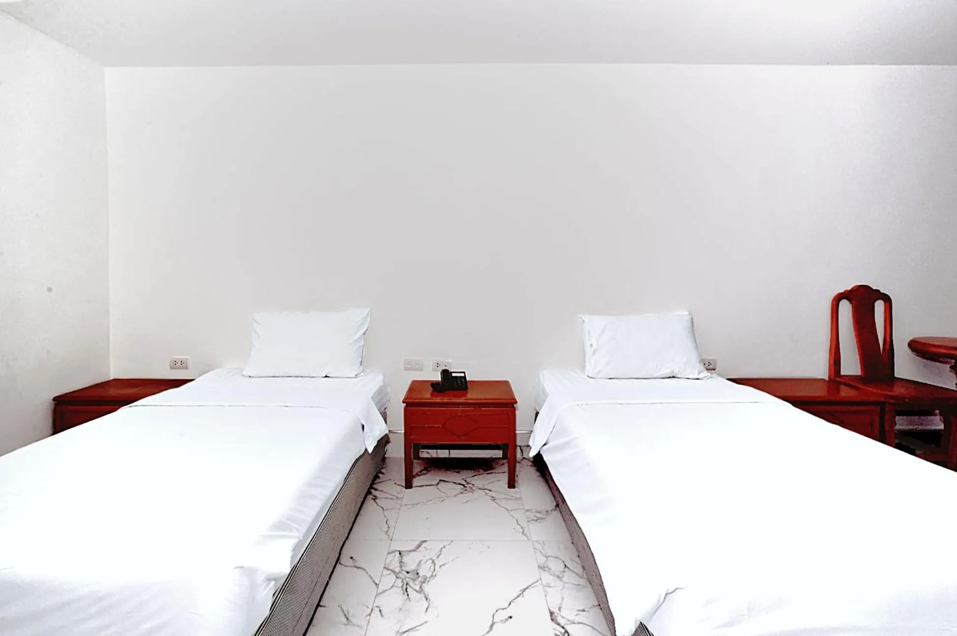 Bed in Highfive Hotel Pattaya