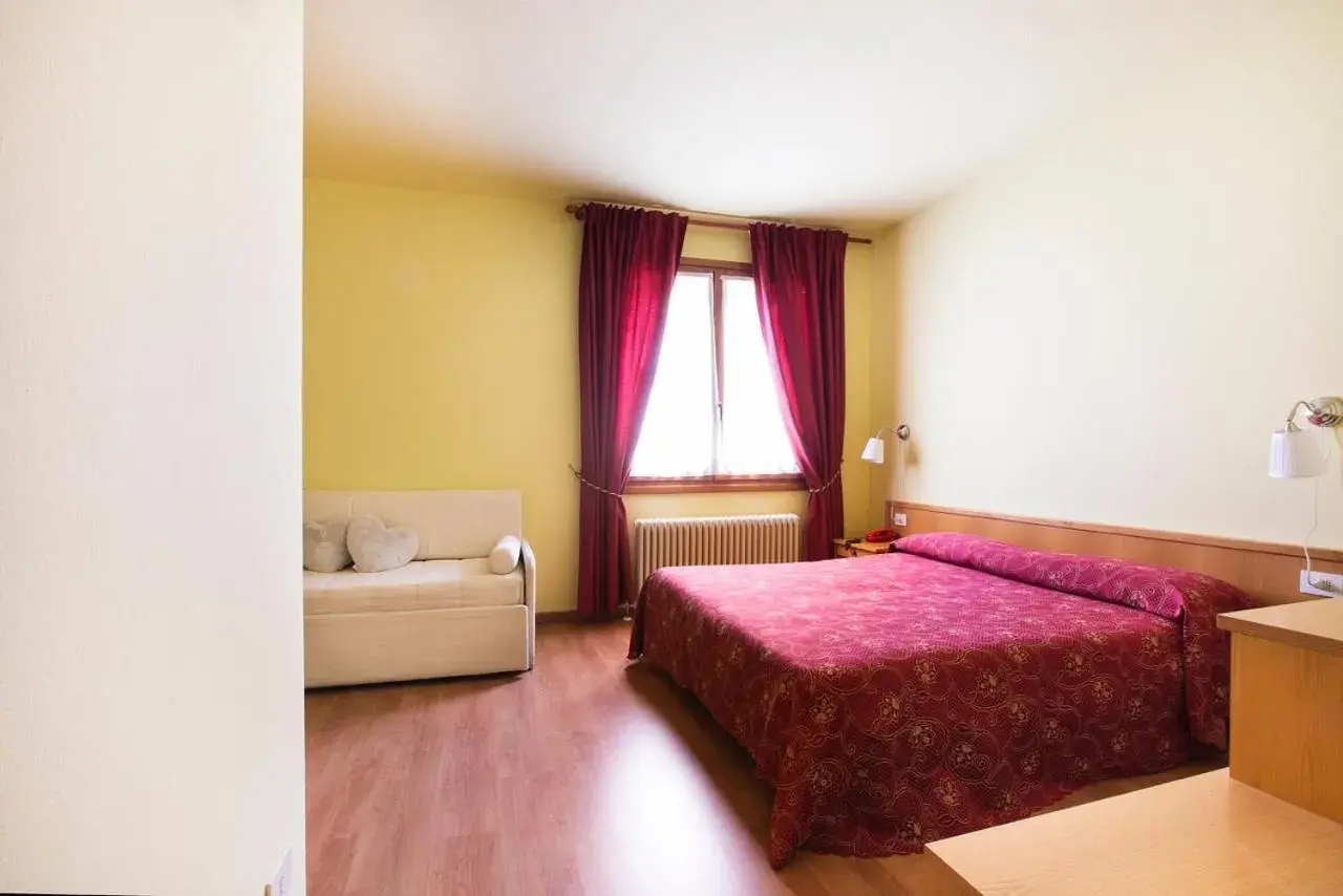 Family Room (2 Adults + 2 Children) in Hotel Piuro Family Room (2 Adults + 2 Children) in Hotel Piuro