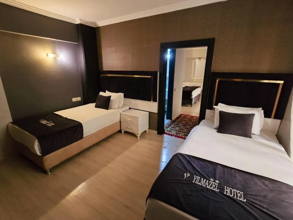 Bed in Yilmazel Hotel