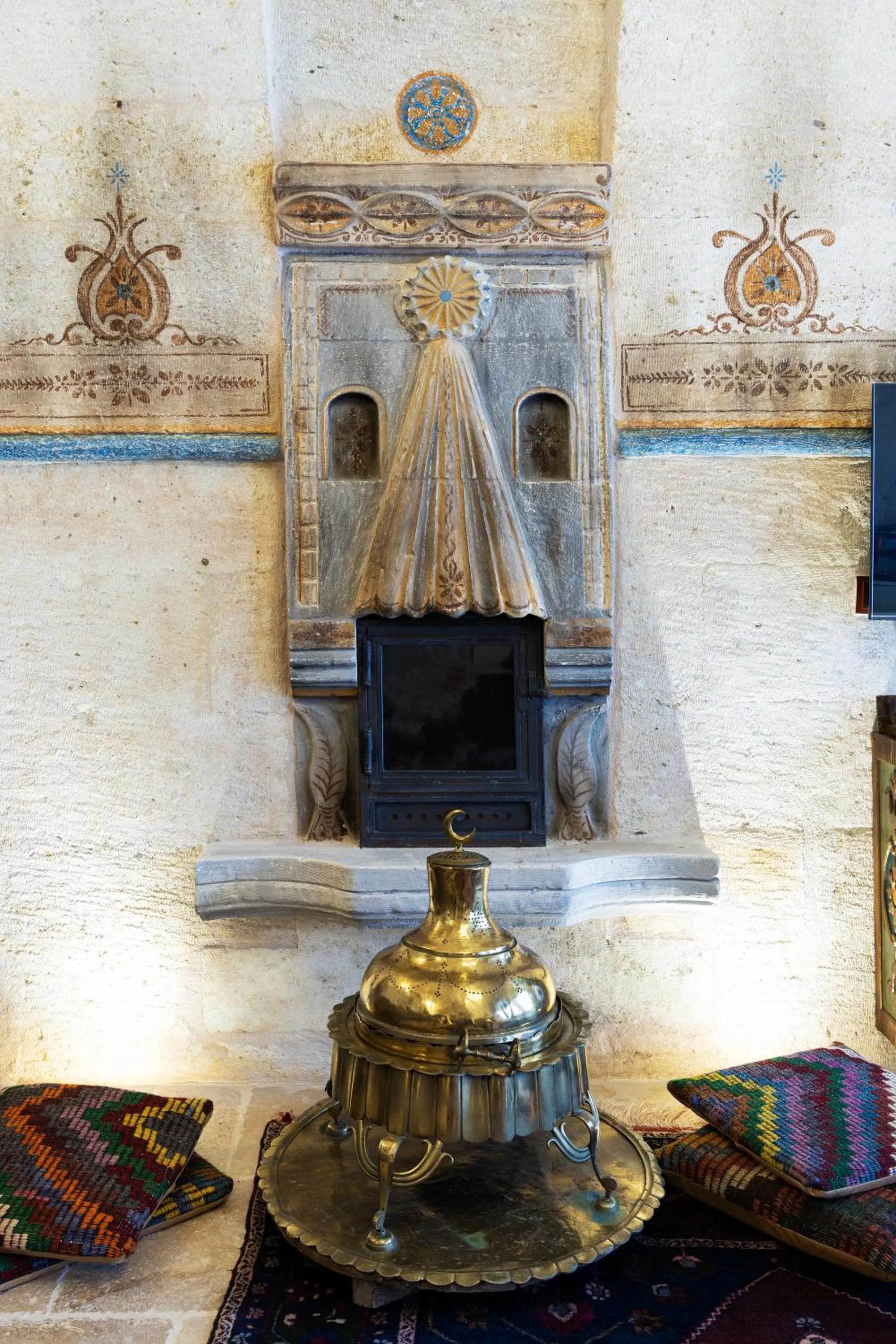 fireplace in Tafoni Houses Cave Hotel